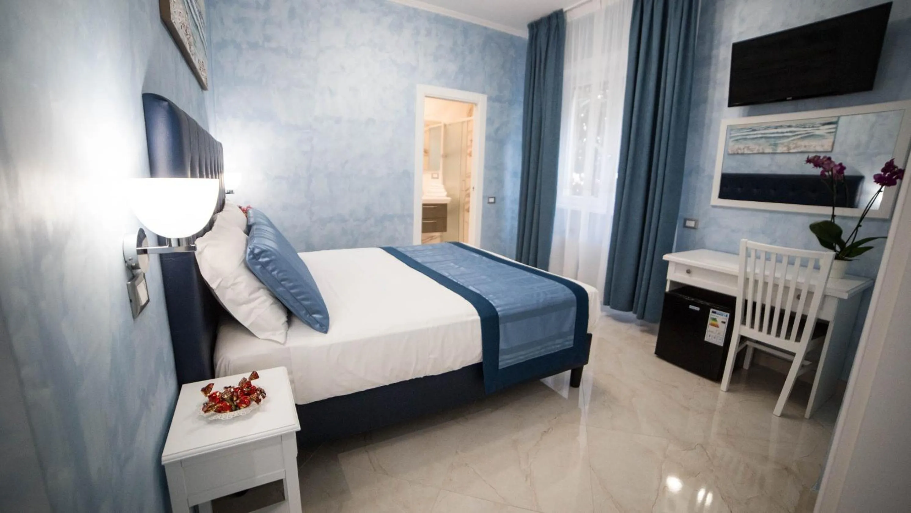 Bed in St. Peter Area Luxury Suites
