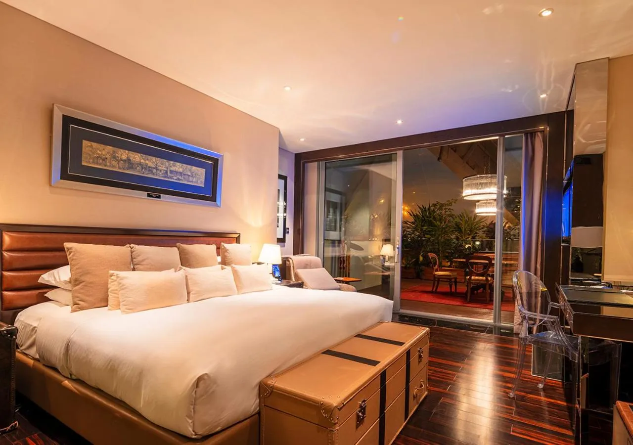 Bed in Hotel Éclat Beijing