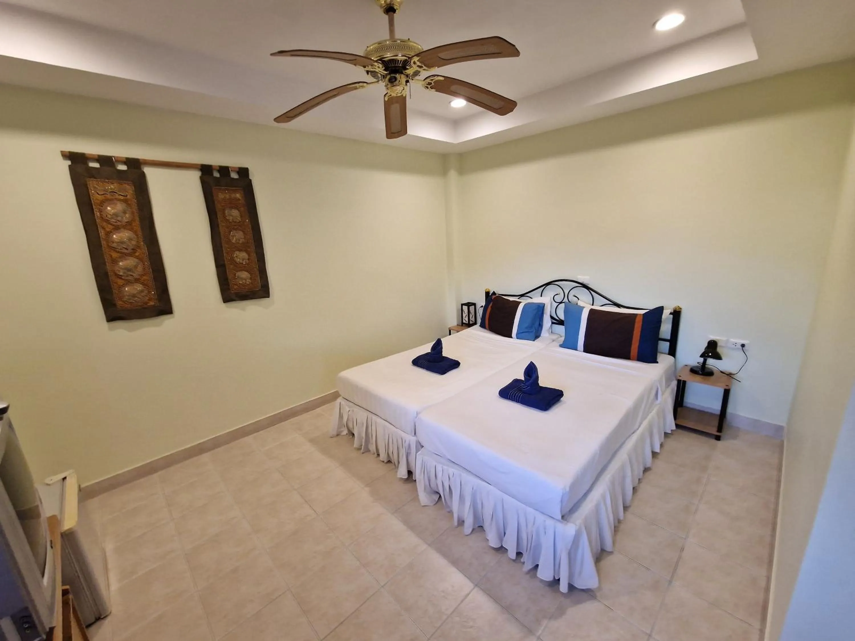 Bed in Villa Oranje Chiang Mai