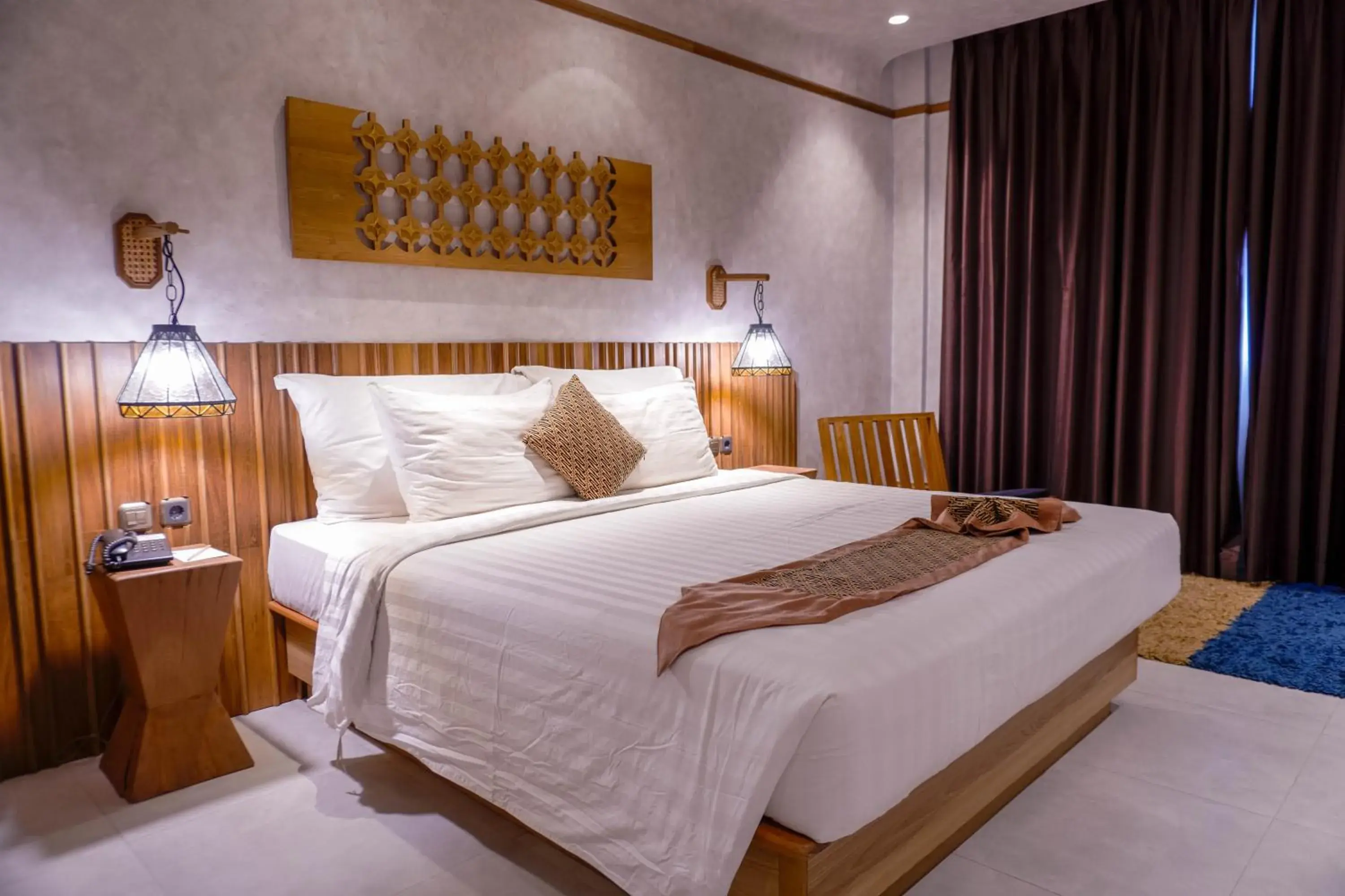 Bed in de JAVA Hotel Bandung Bed in de JAVA Hotel Bandung