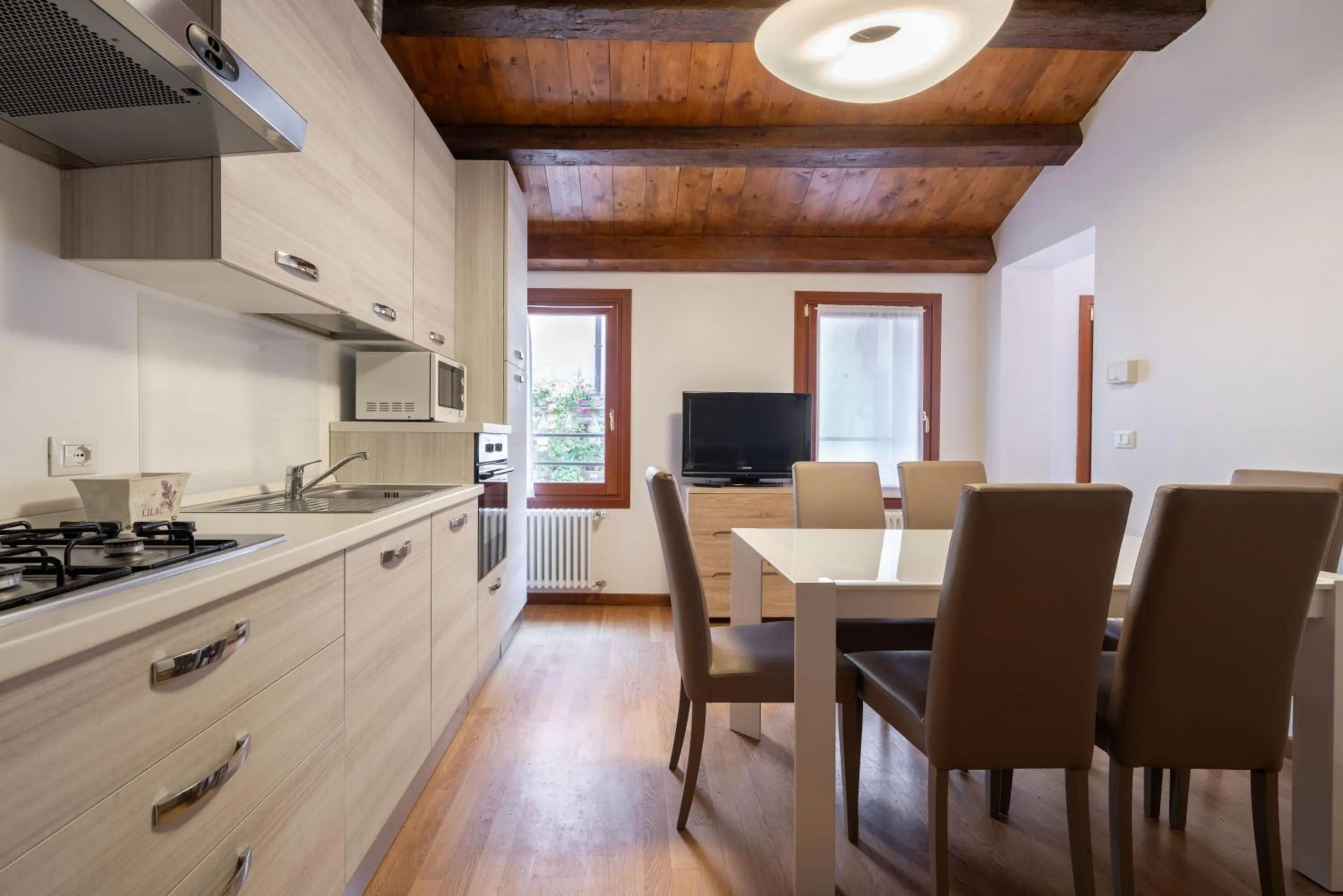 Kitchen or kitchenette in Design Palace Apartment by Wonderful Italy