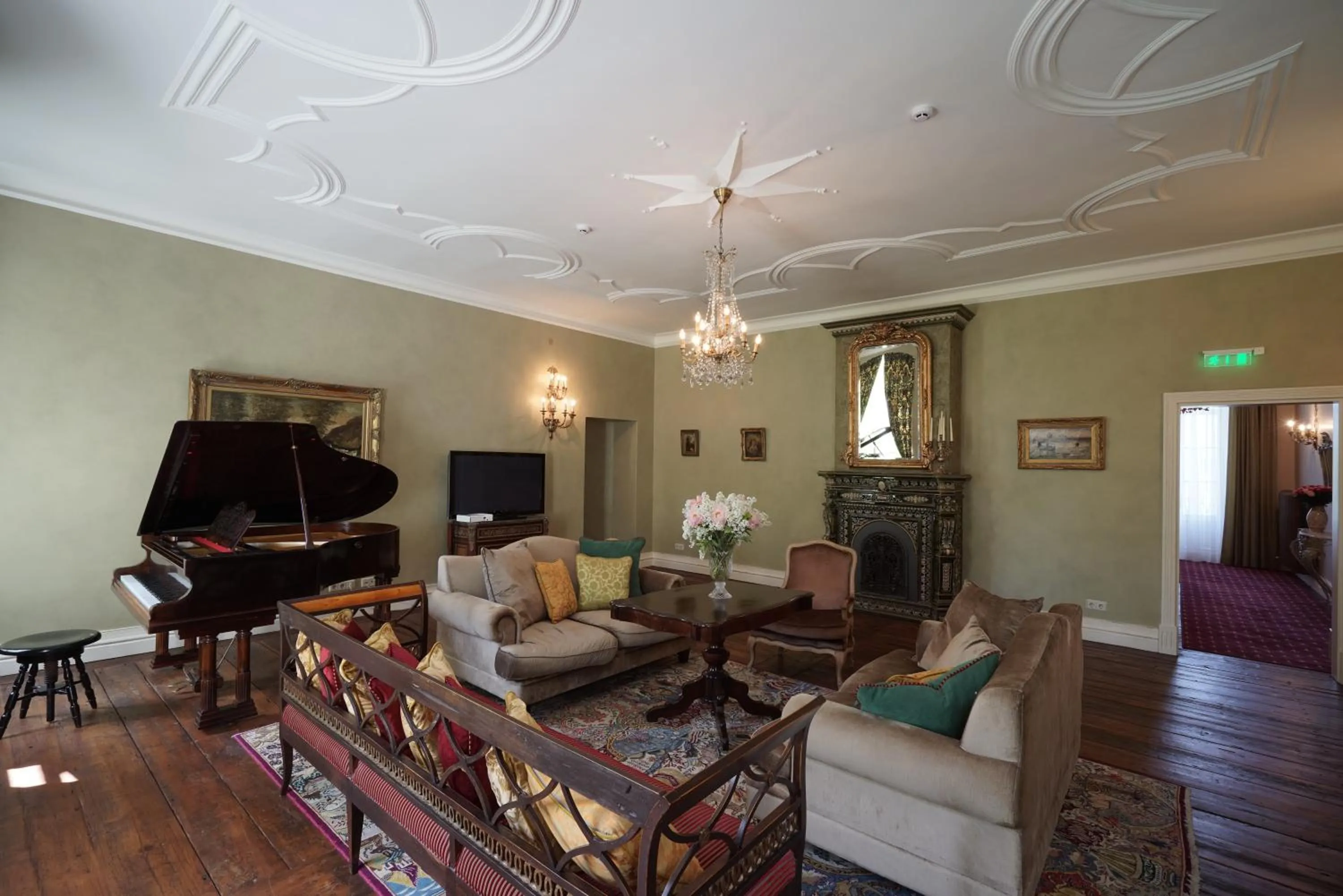 Communal lounge/ TV room in Liepupe Manor