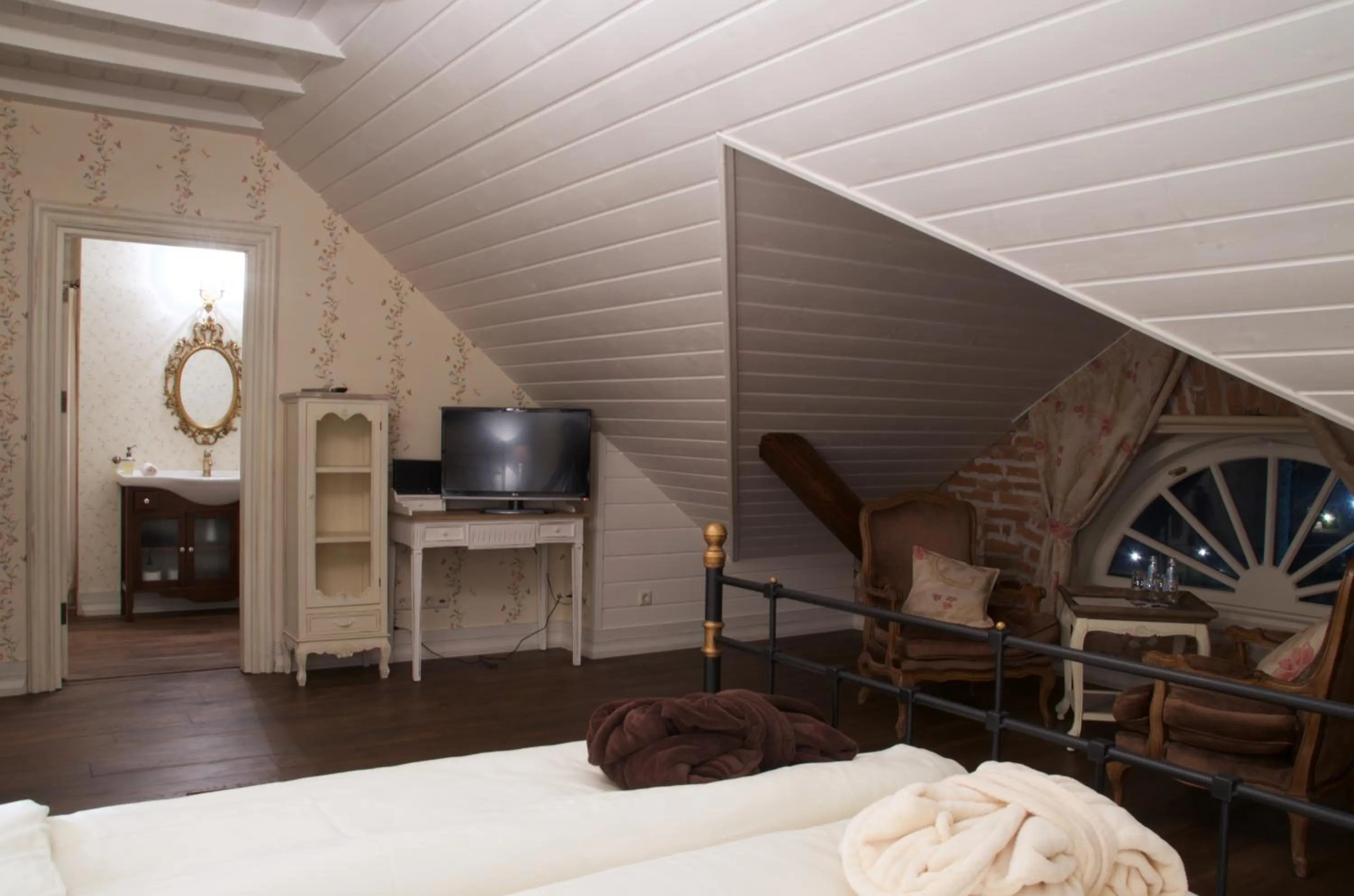 Seating area, Bed in Liepupe Manor