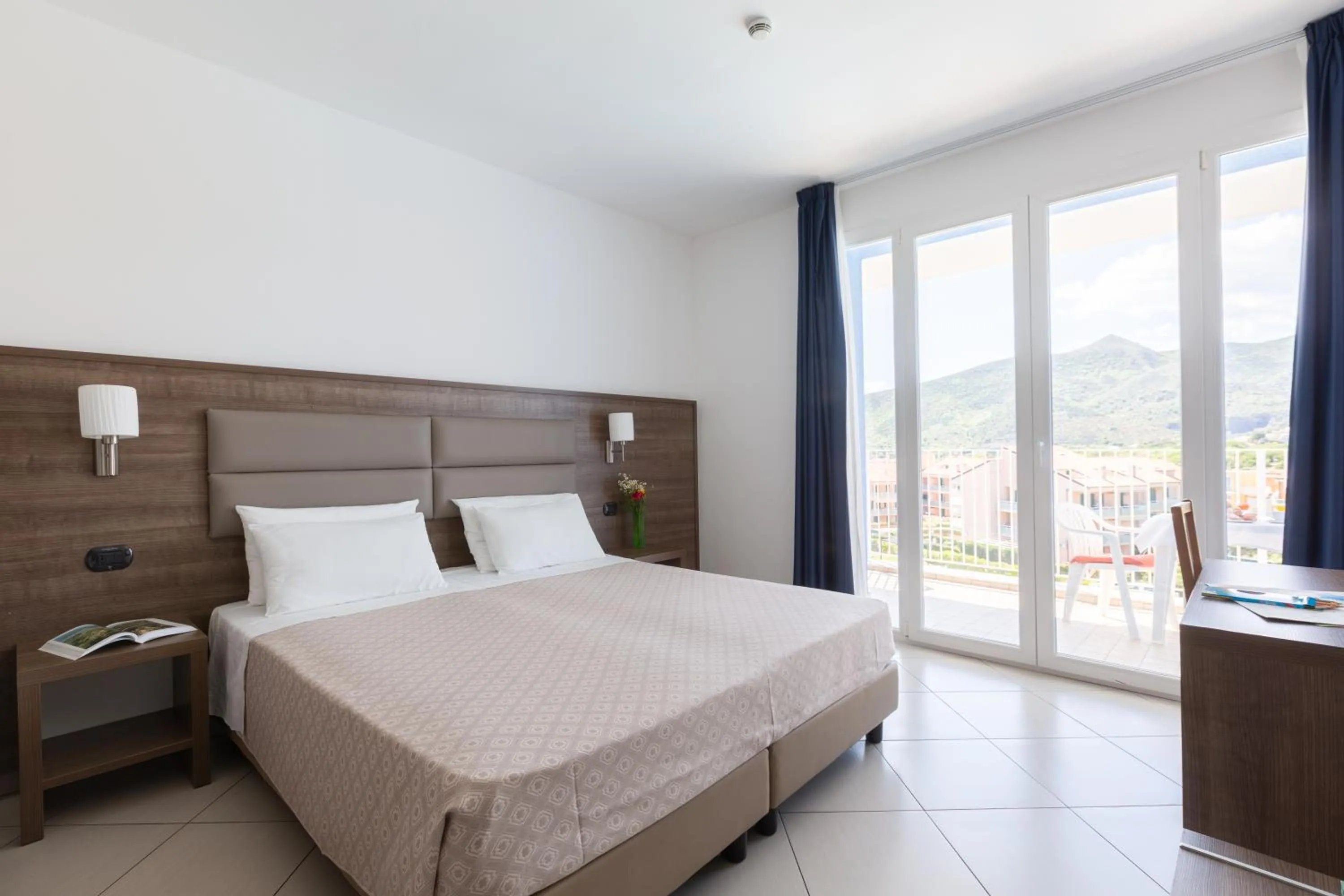 Bed in Ai Pozzi Village Resort & SPA