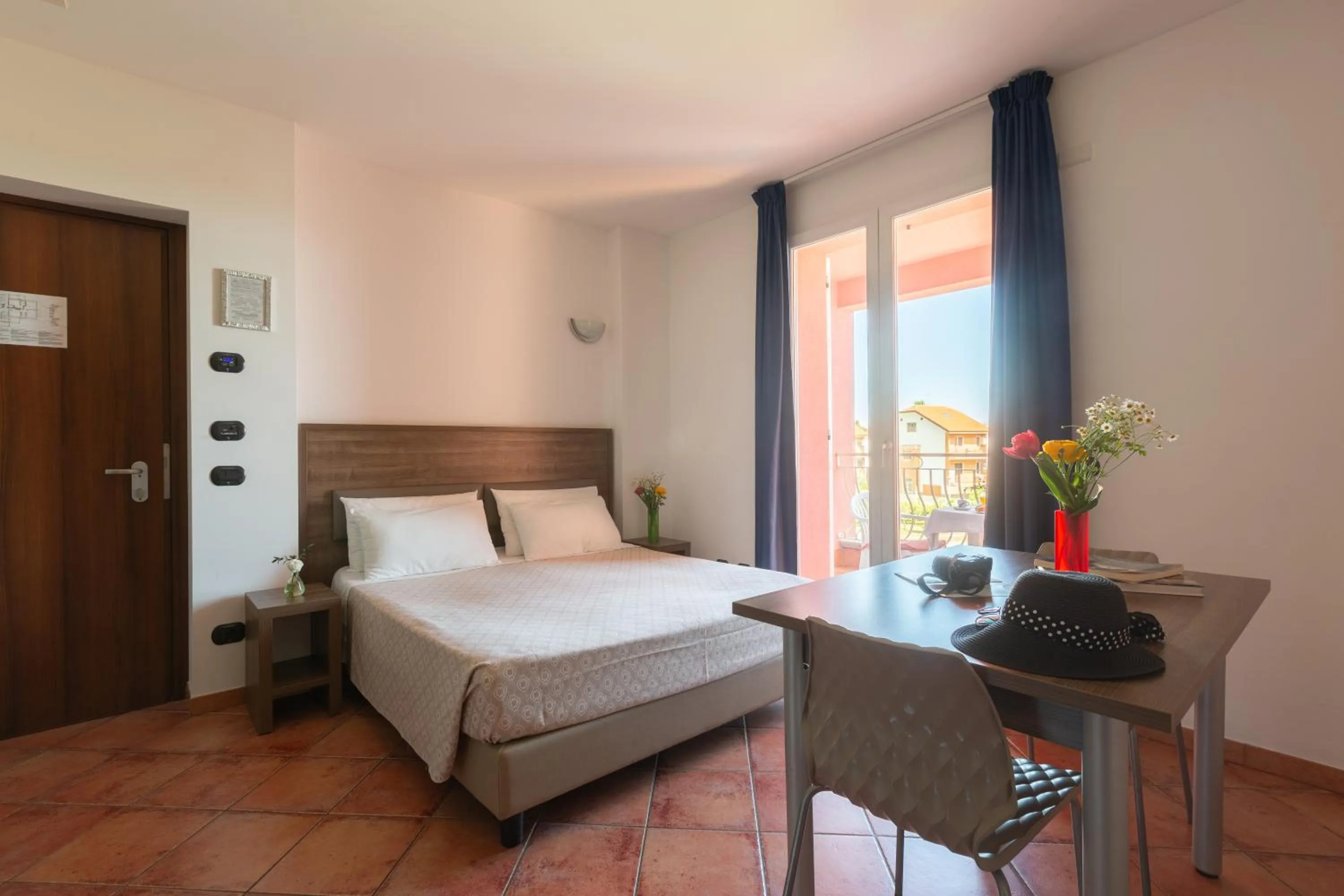 Bed in Ai Pozzi Village Resort & SPA