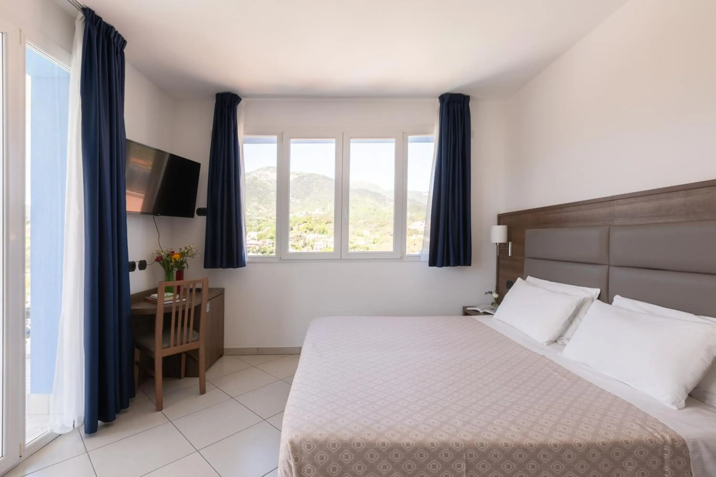 Double Room with Mountain View in Ai Pozzi Village Resort & SPA Double Room with Mountain View in Ai Pozzi Village Resort & SPA