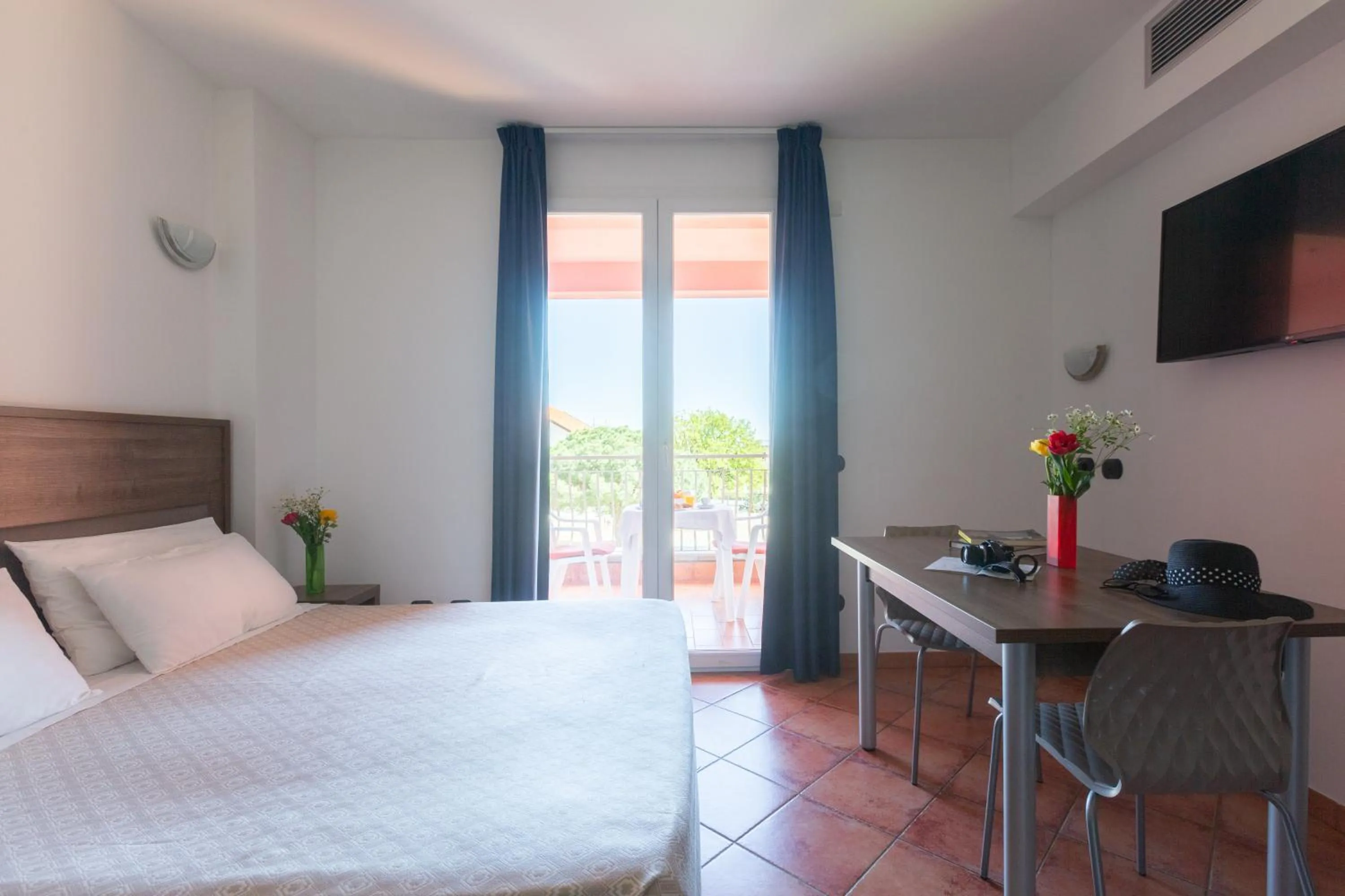 Bed in Ai Pozzi Village Resort & SPA