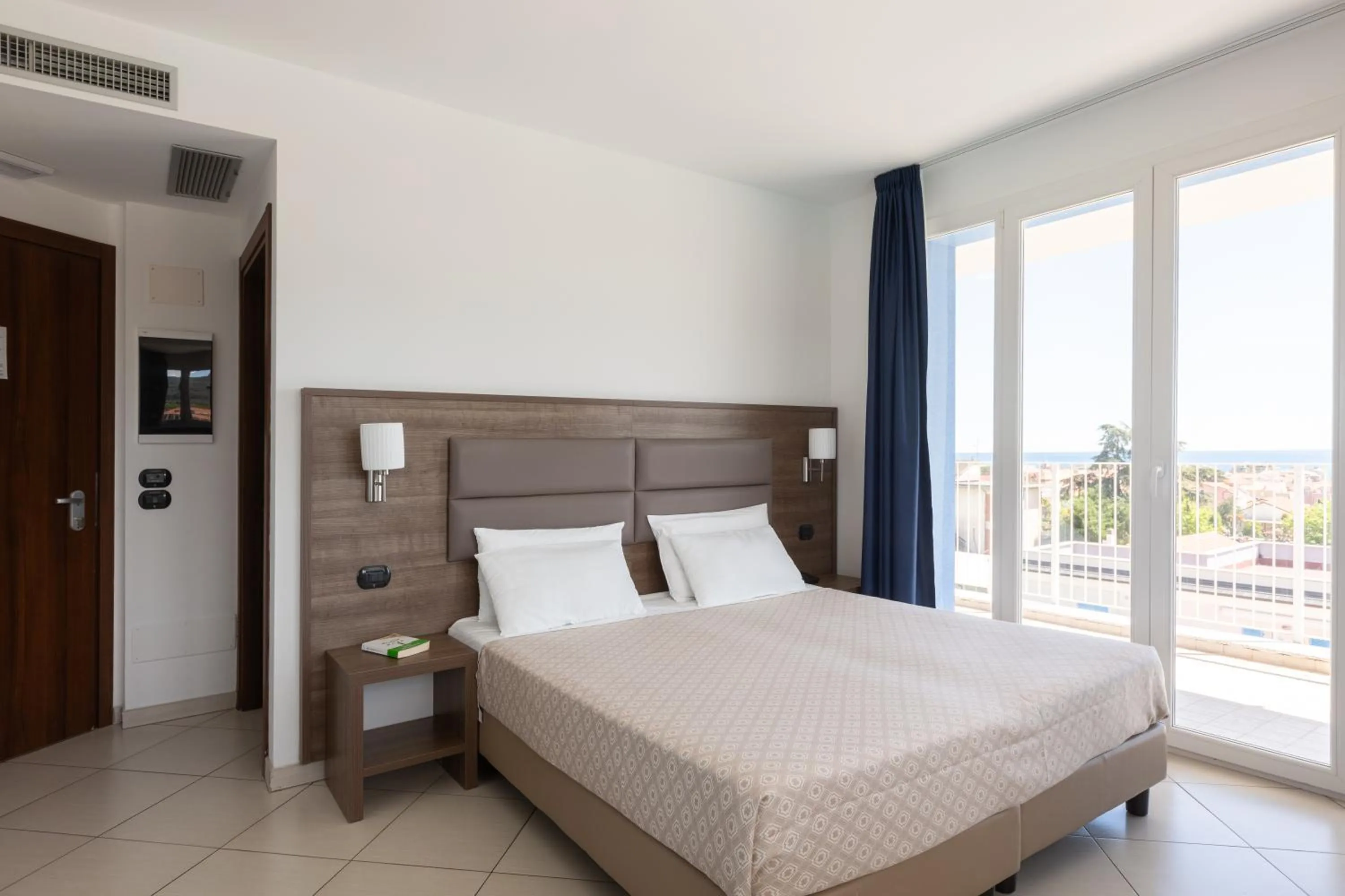 Bed in Ai Pozzi Village Resort & SPA