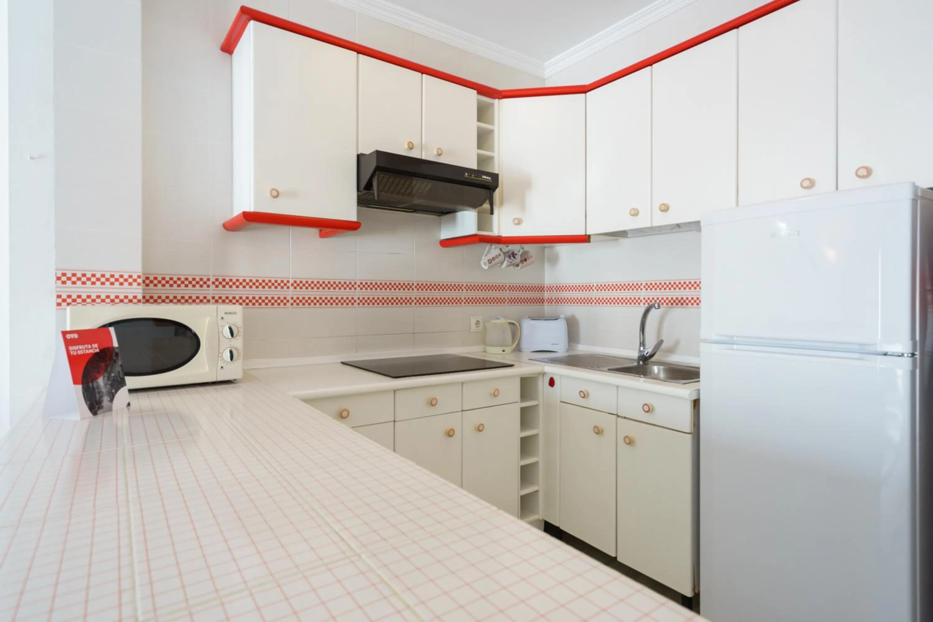 Kitchen or kitchenette in Apartamentos Pepe Mesa