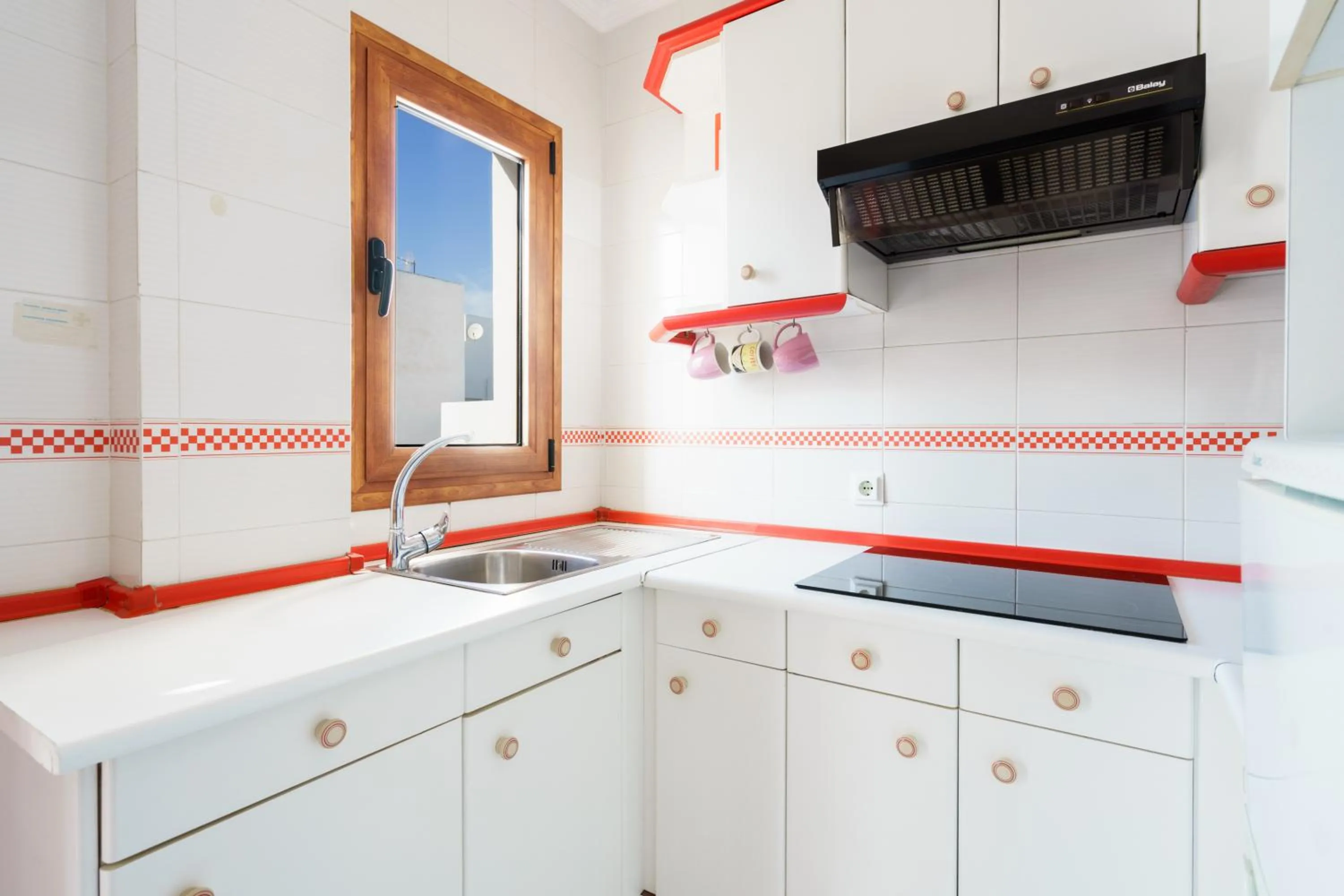 Kitchen or kitchenette in Apartamentos Pepe Mesa