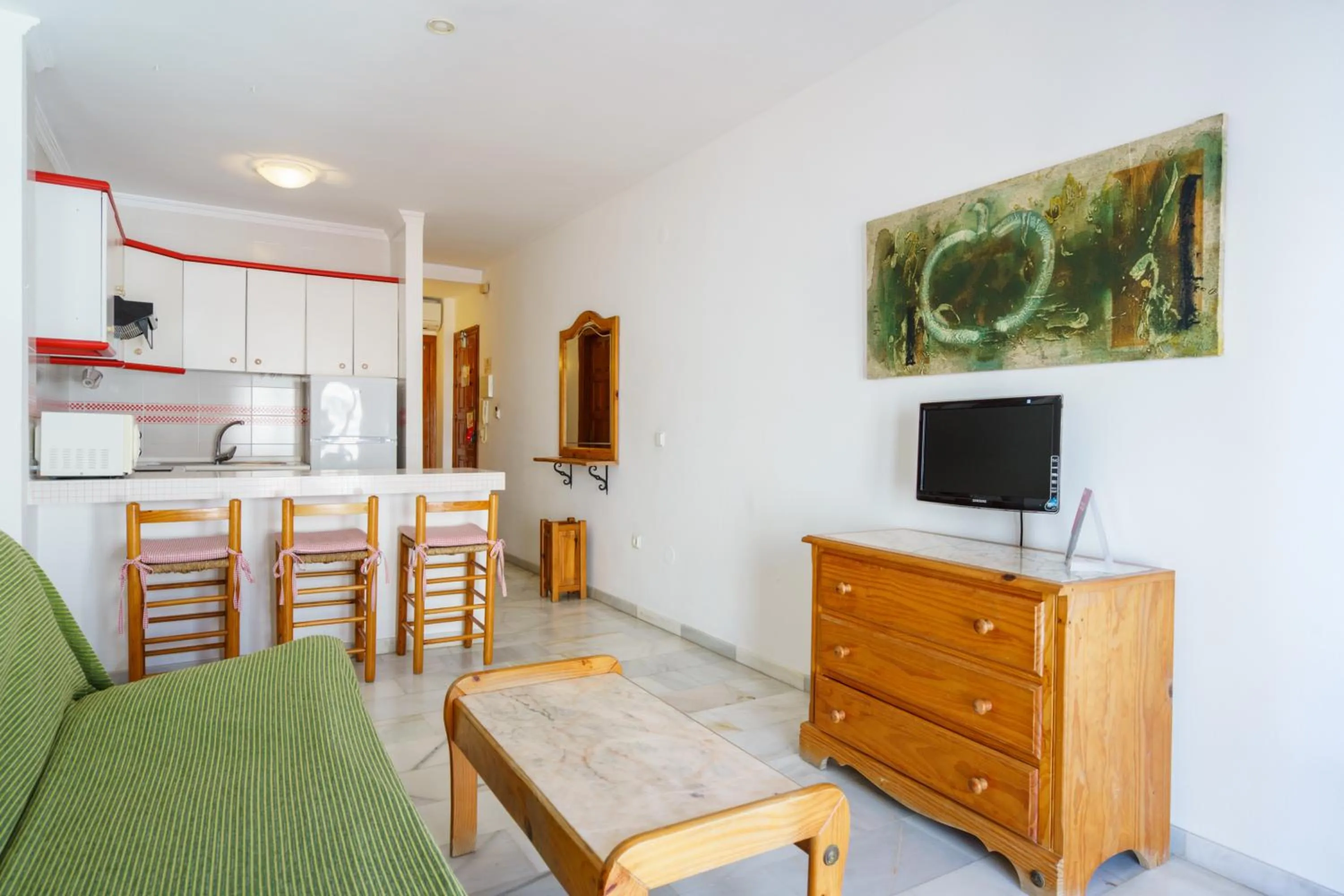 Kitchen or kitchenette in Apartamentos Pepe Mesa