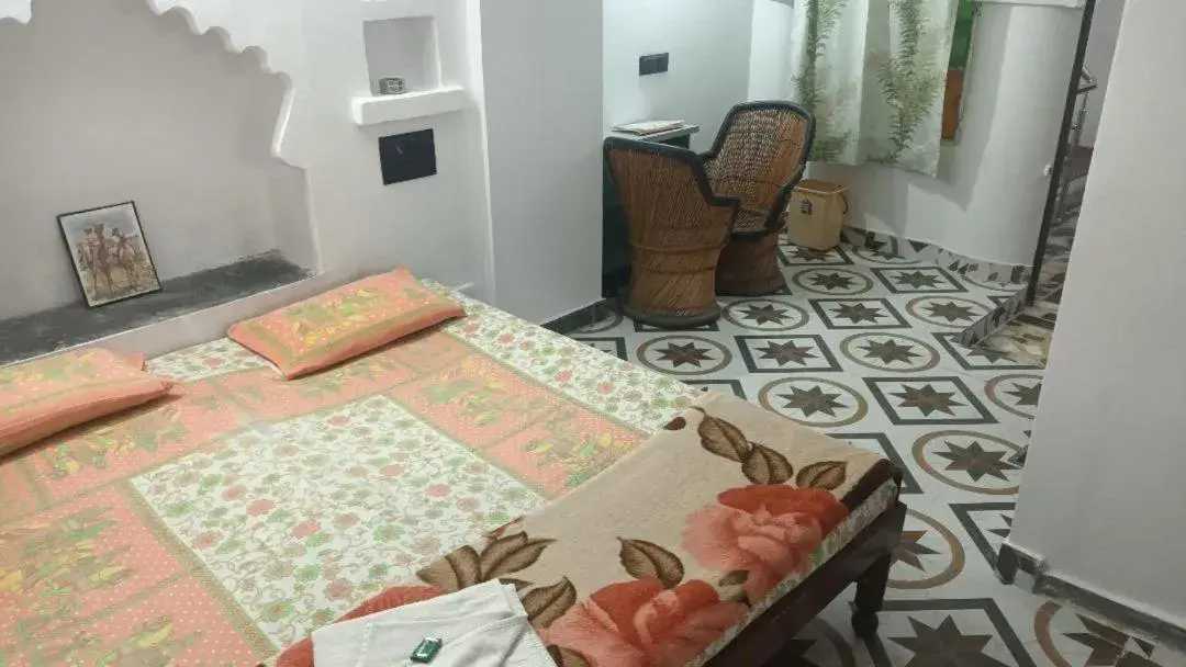 Photo of the whole room, Bed in Jag Niwas Guest House & pure veg restaurant Photo of the whole room, Bed in Jag Niwas Guest House & pure veg restaurant