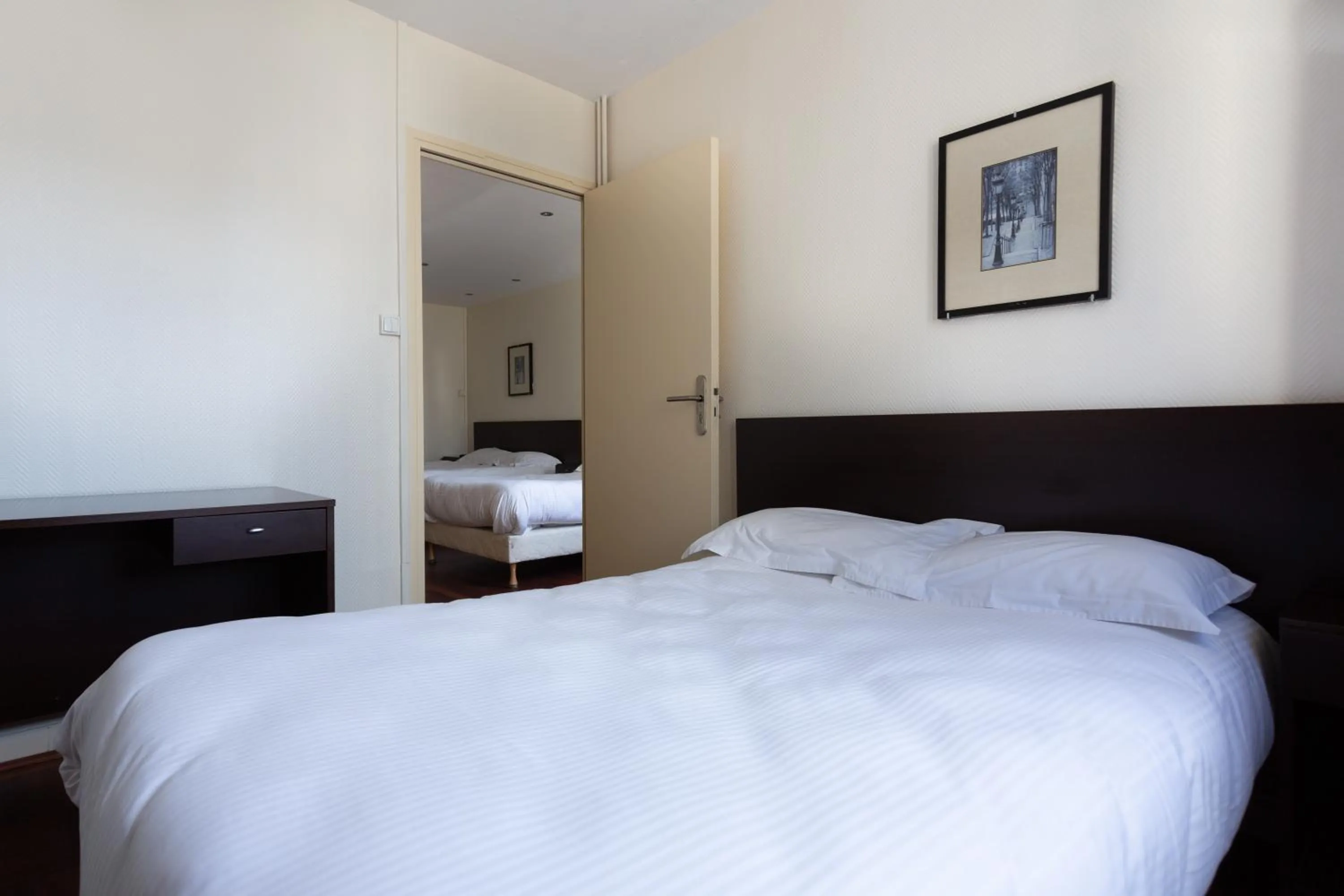 Photo of the whole room, Bed in Hotel Mimosa Paris