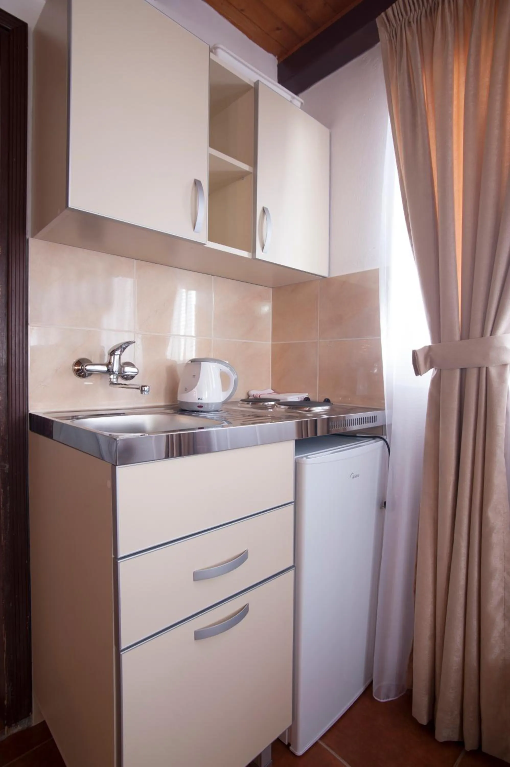 Kitchen or kitchenette in Apartments Grand