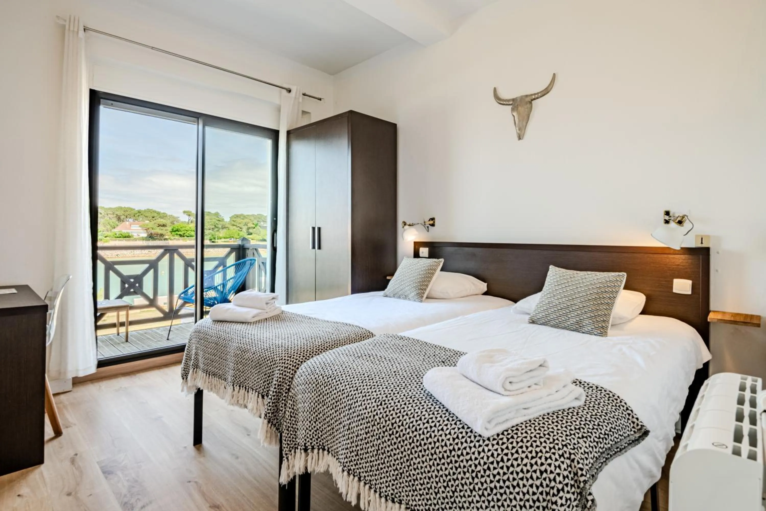 Bed in Single Fin Hotel & Lodge