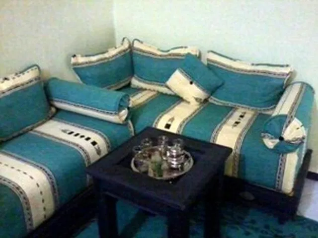 Living room, Bed in Hôtel Tijani
