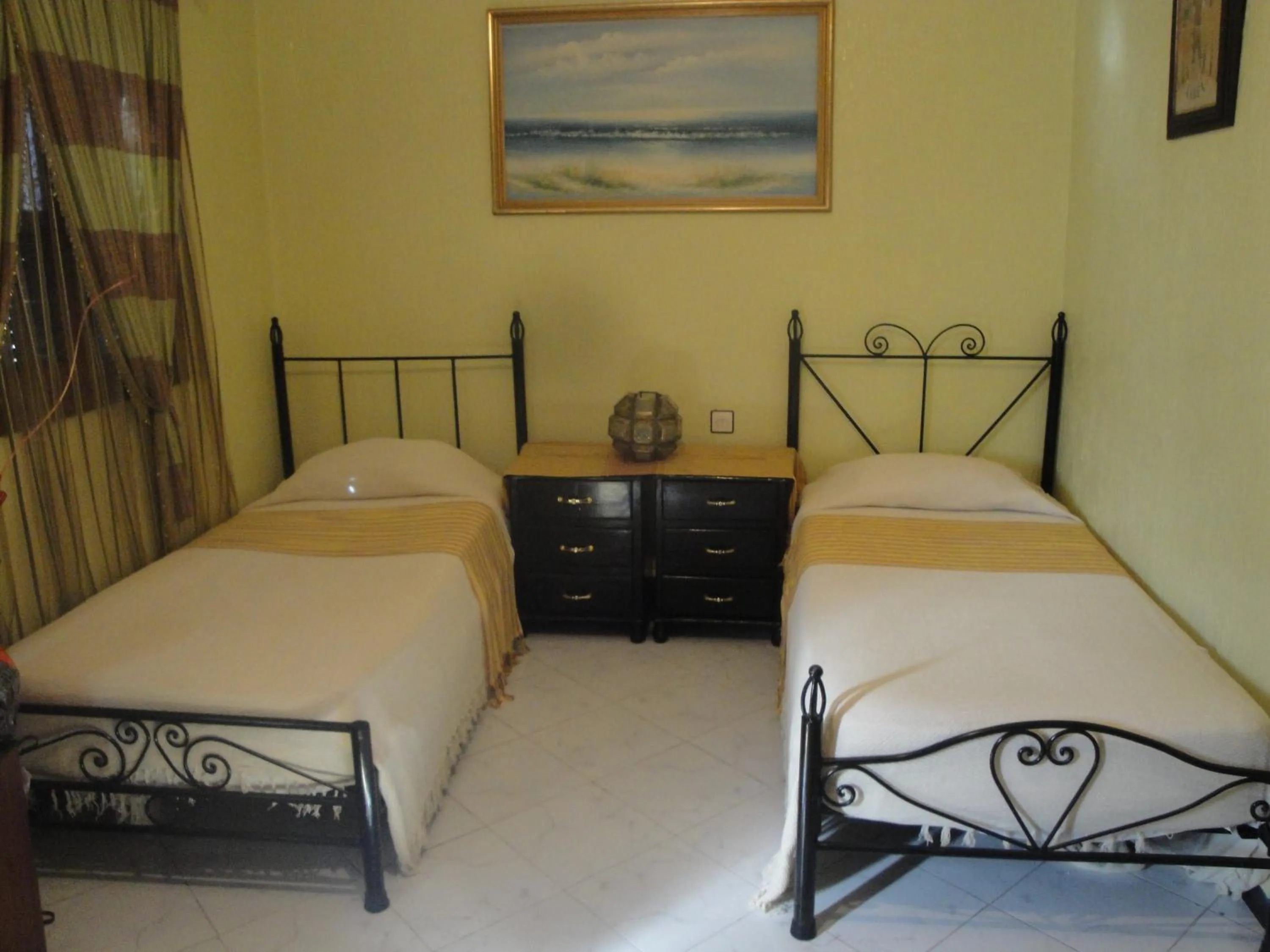 Photo of the whole room, Bed in Hôtel Tijani