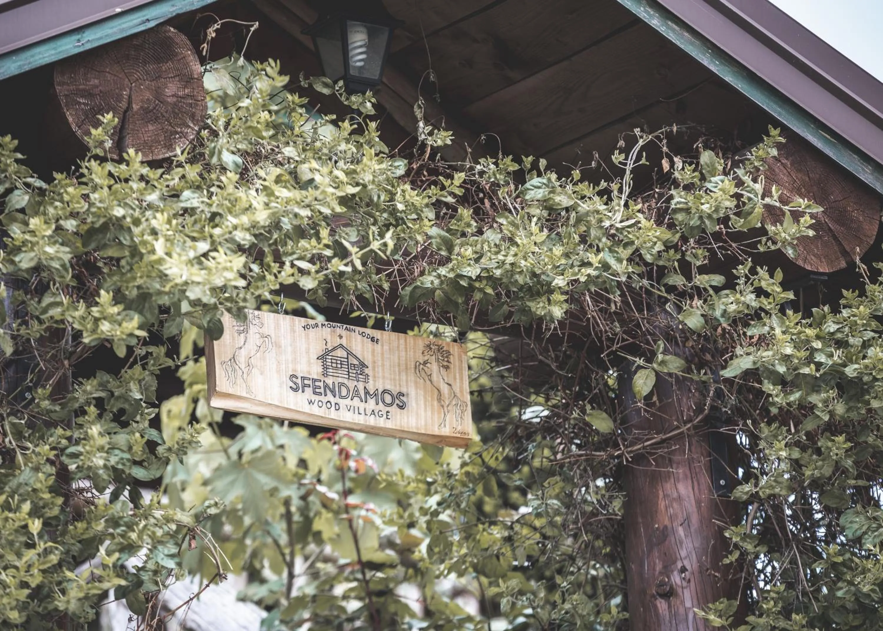 Property logo or sign in Sfendamos Wood Village