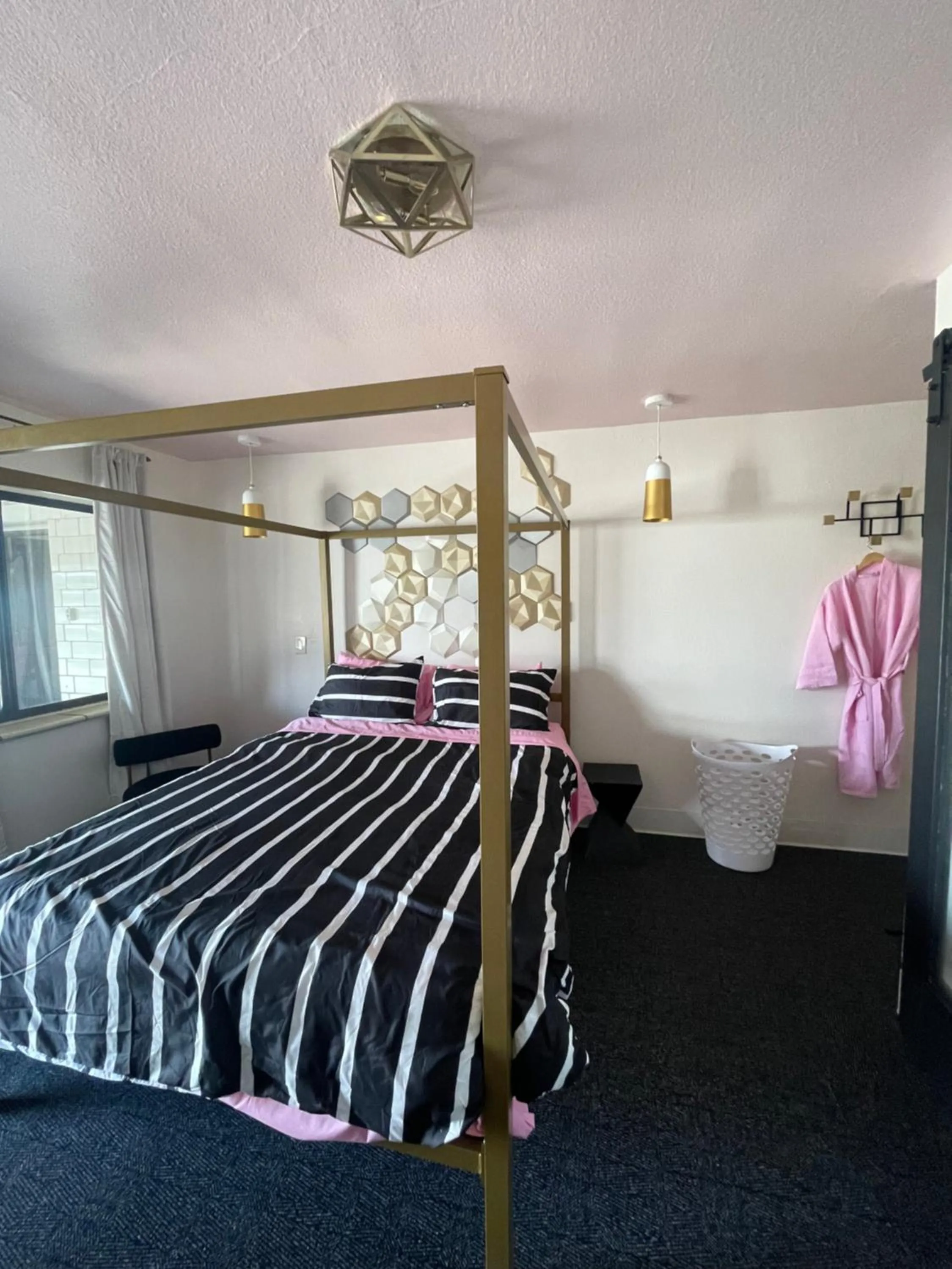 Bed in Rainbow Motel