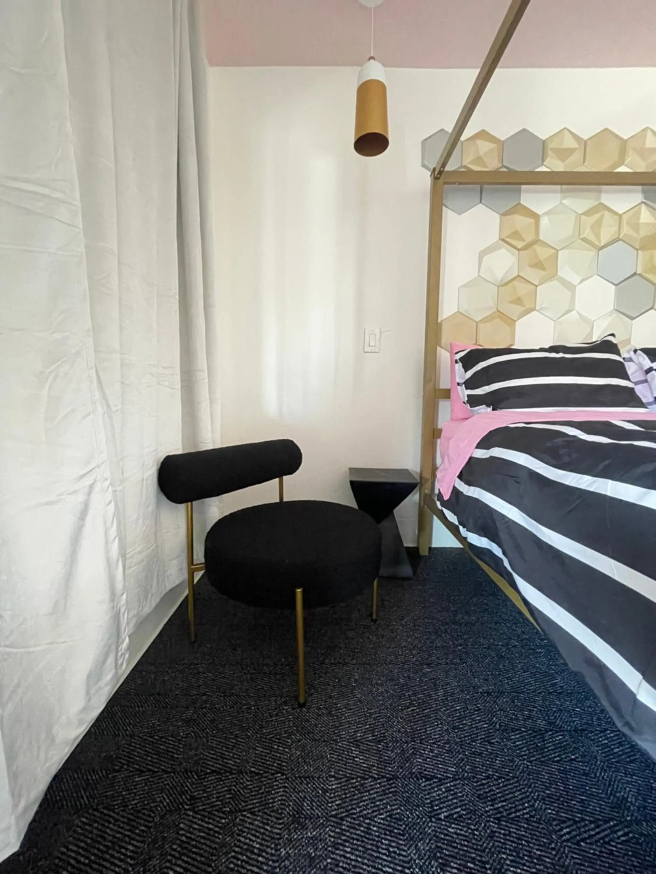 Bed in Rainbow Motel