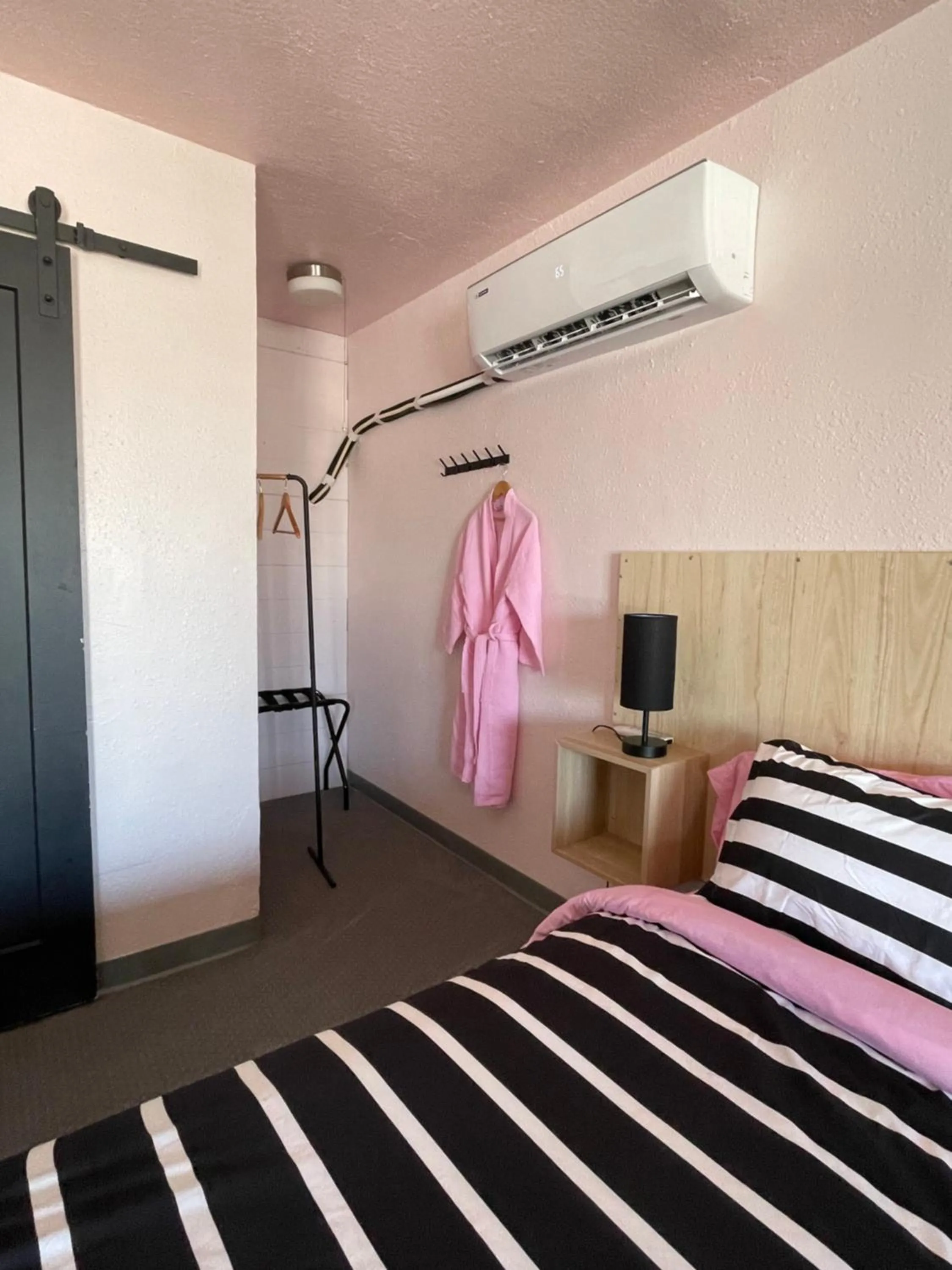 Bed in Rainbow Motel