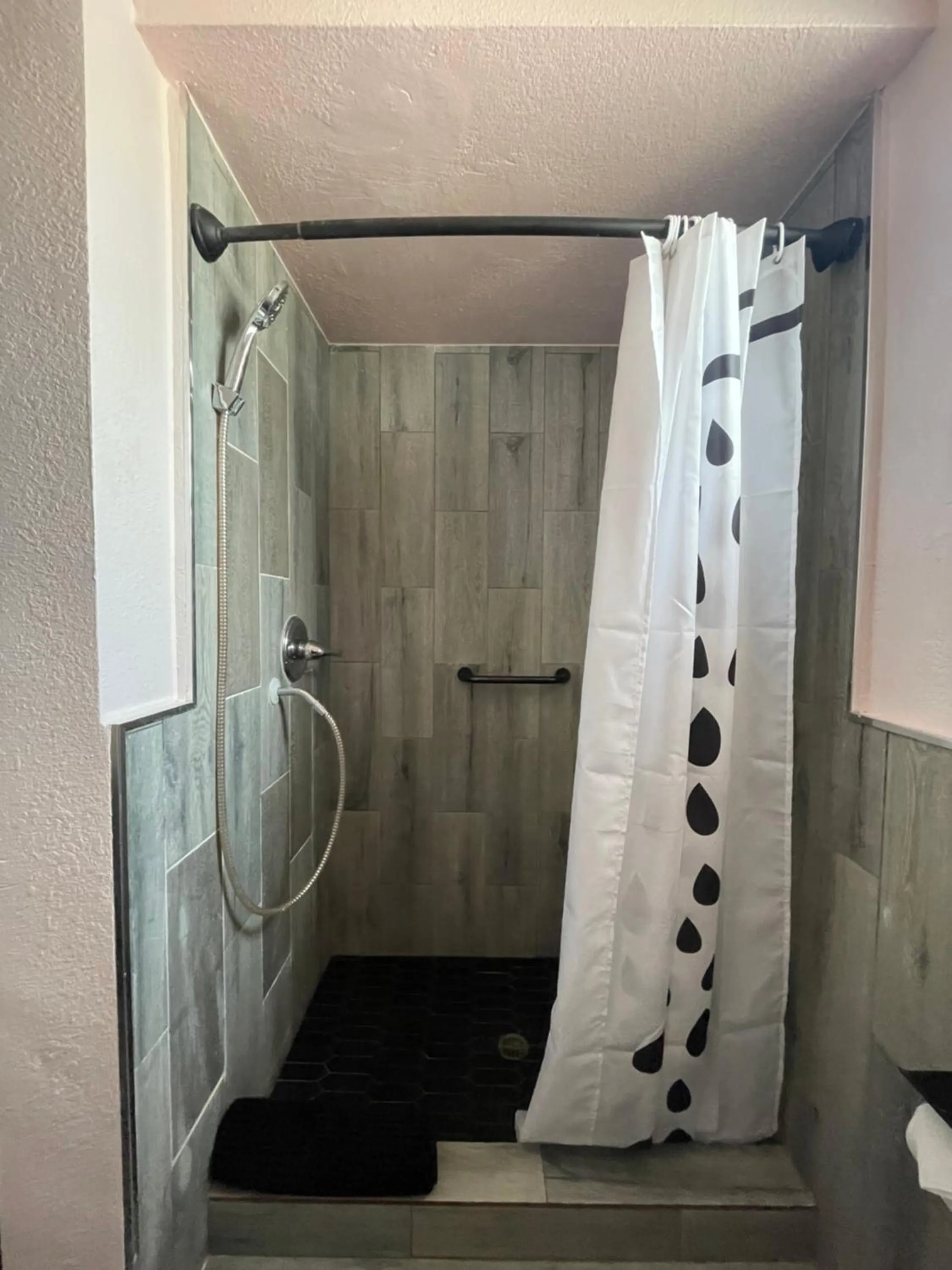 Shower in Rainbow Motel