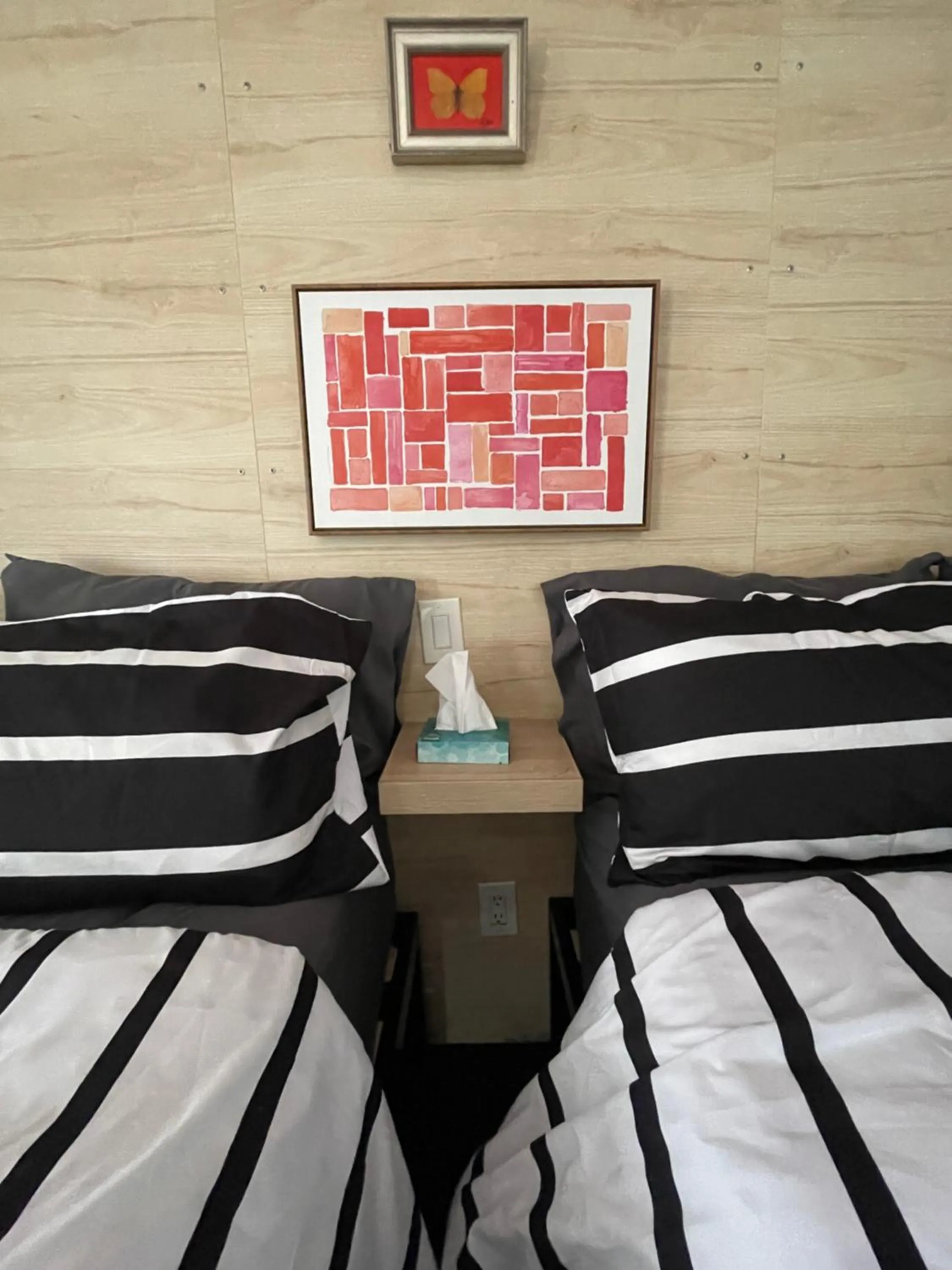 Bed in Rainbow Motel