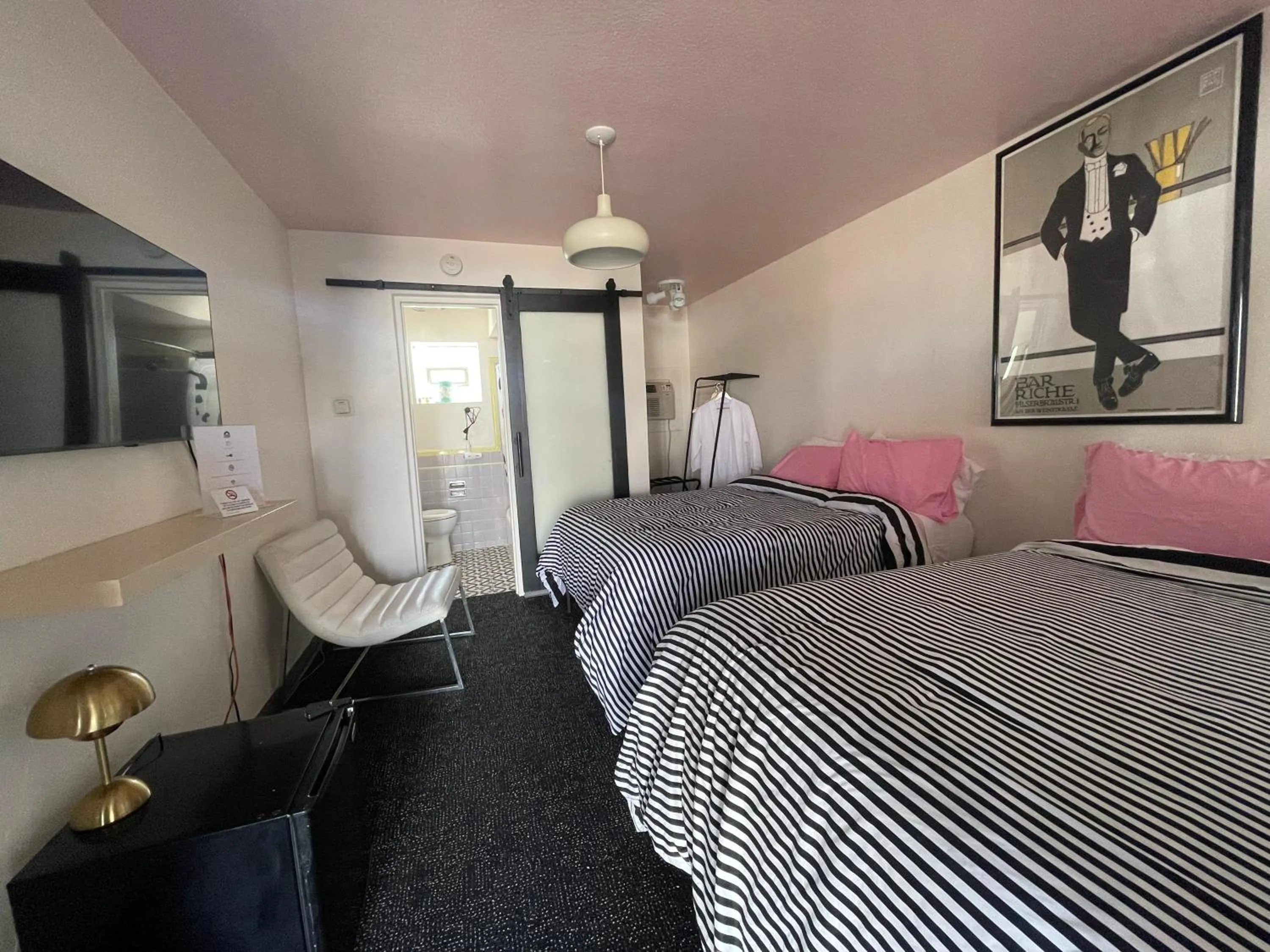 Bed in Rainbow Motel