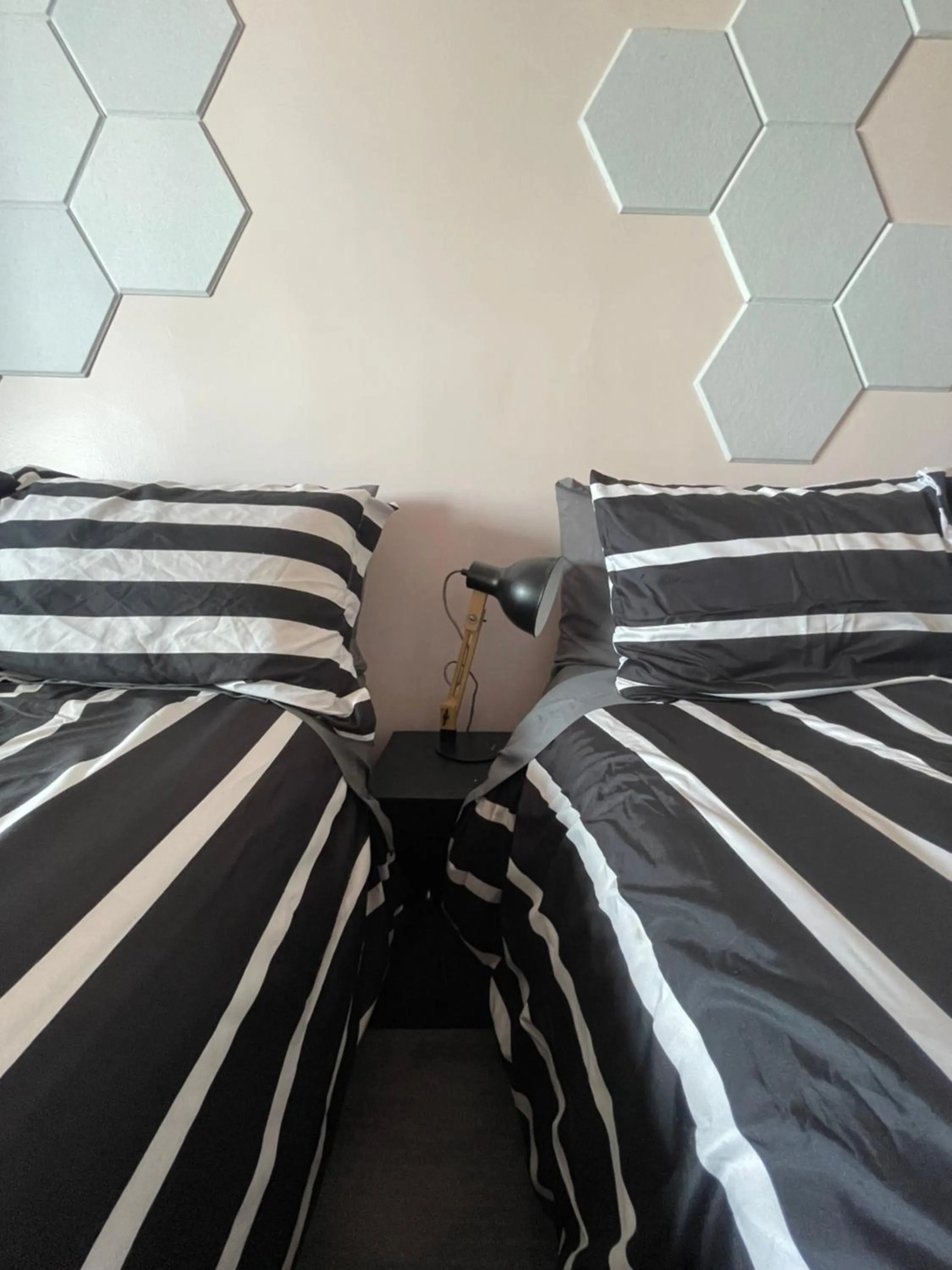 Bed in Rainbow Motel