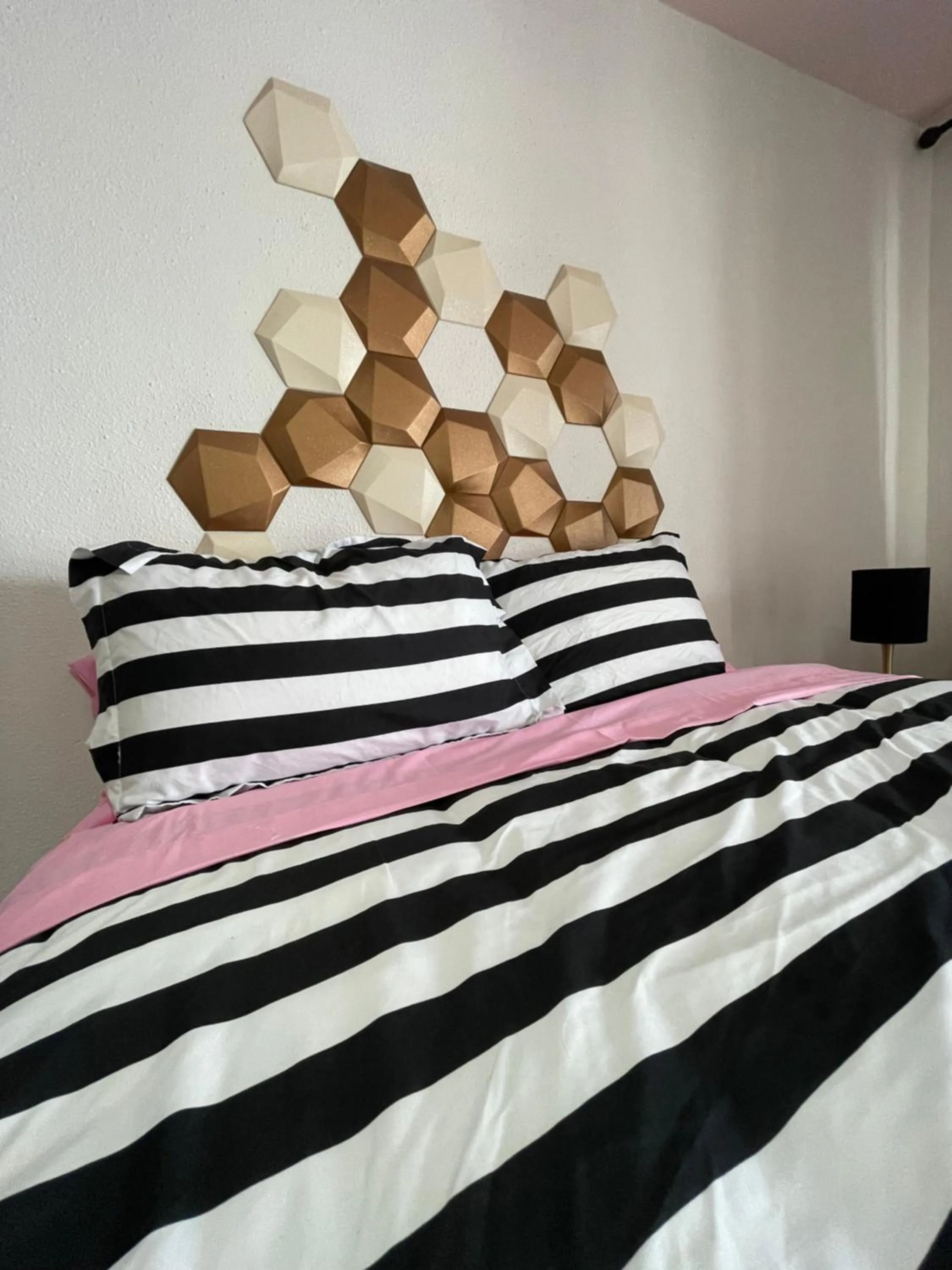 Bed in Rainbow Motel