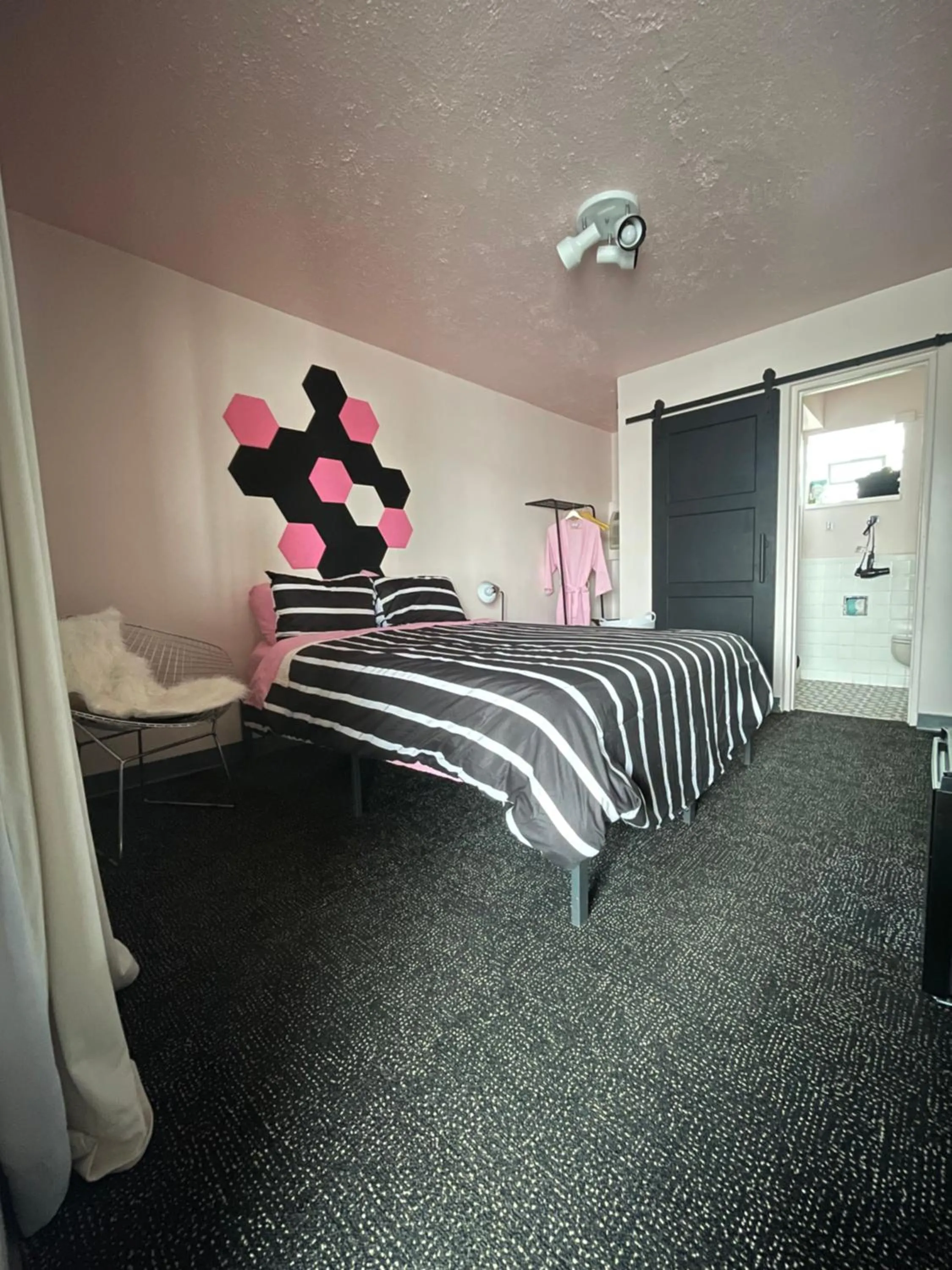 Bed in Rainbow Motel