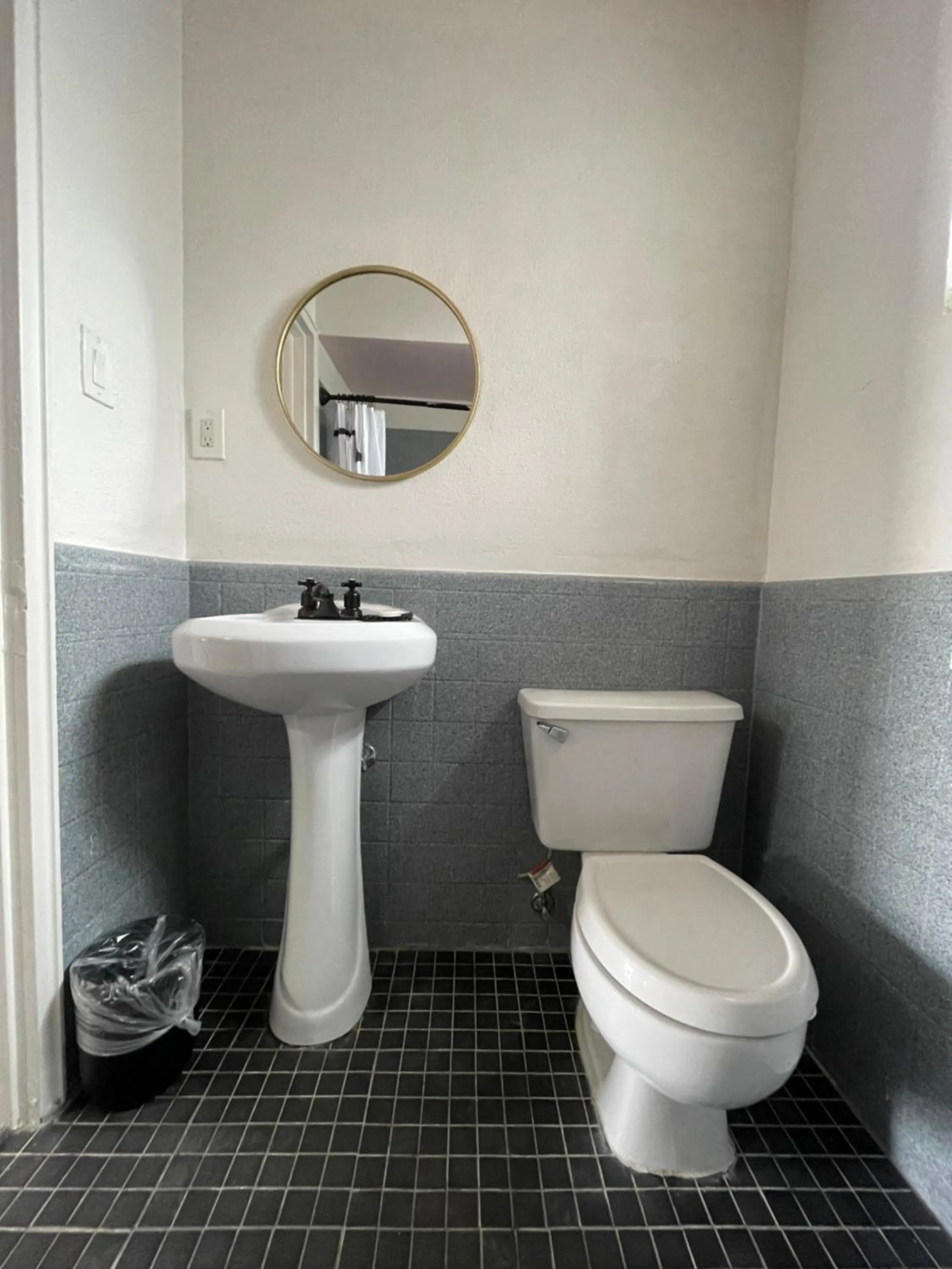 Toilet in Rainbow Motel