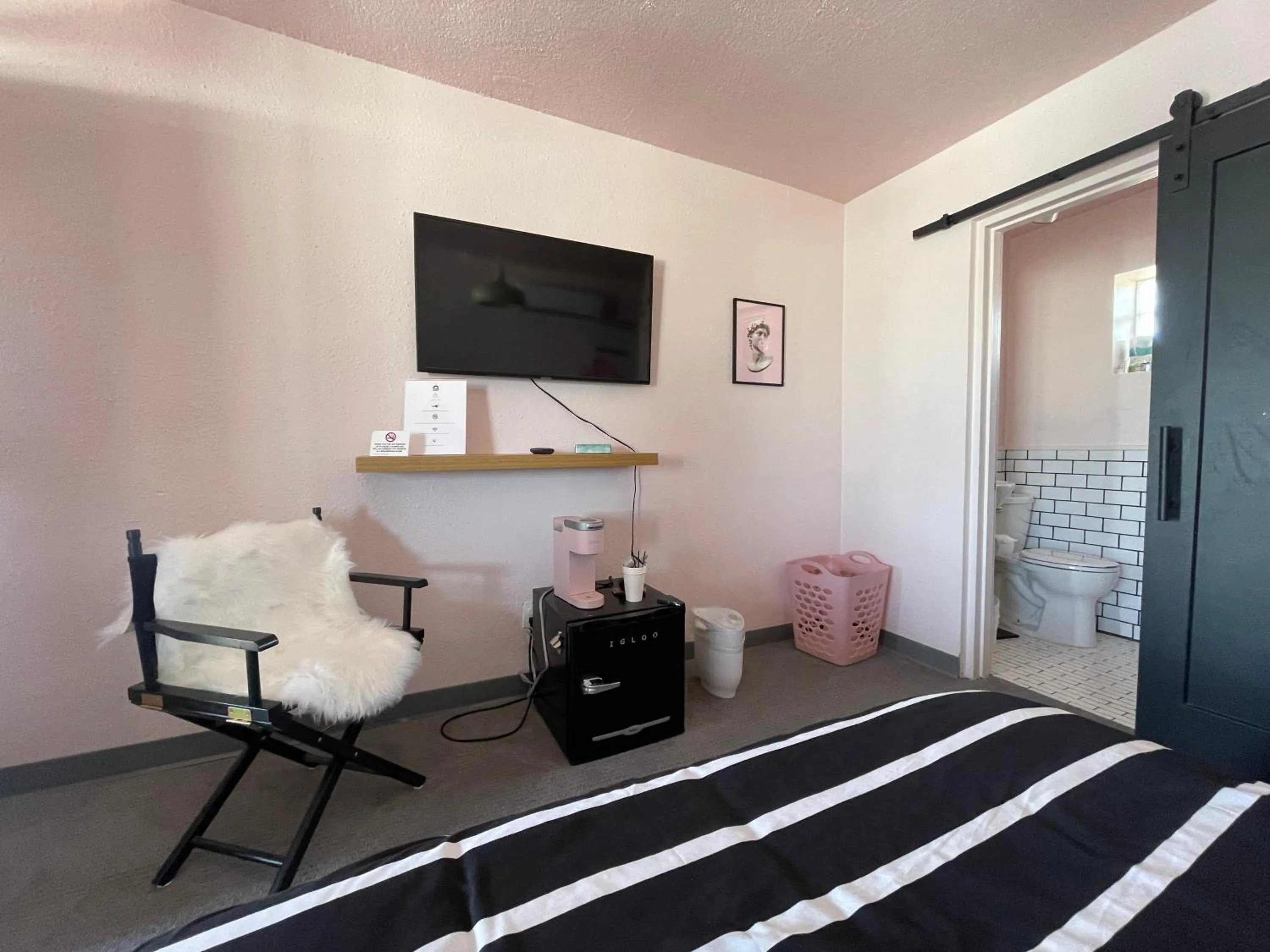 Bed in Rainbow Motel