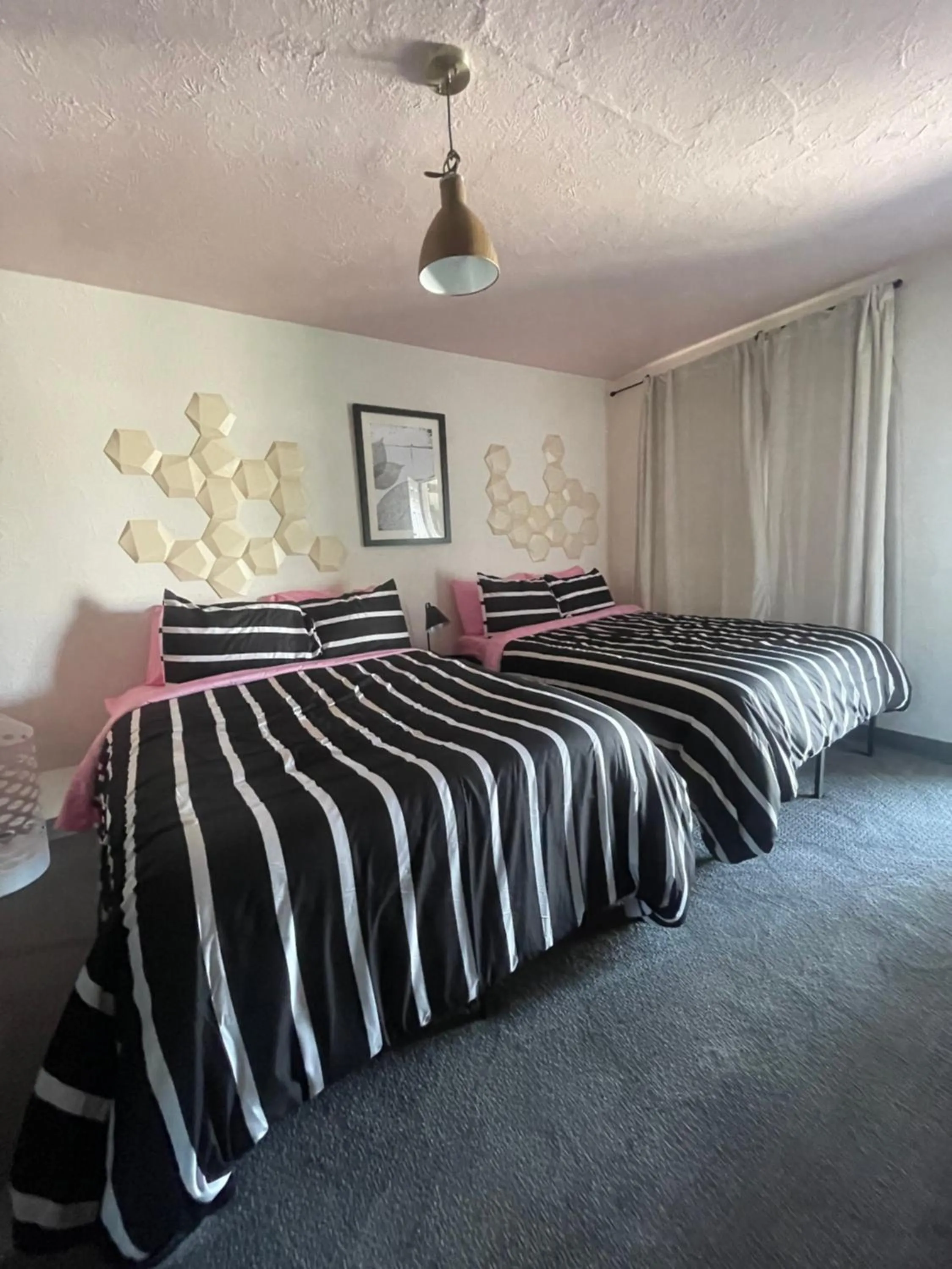 Bed in Rainbow Motel