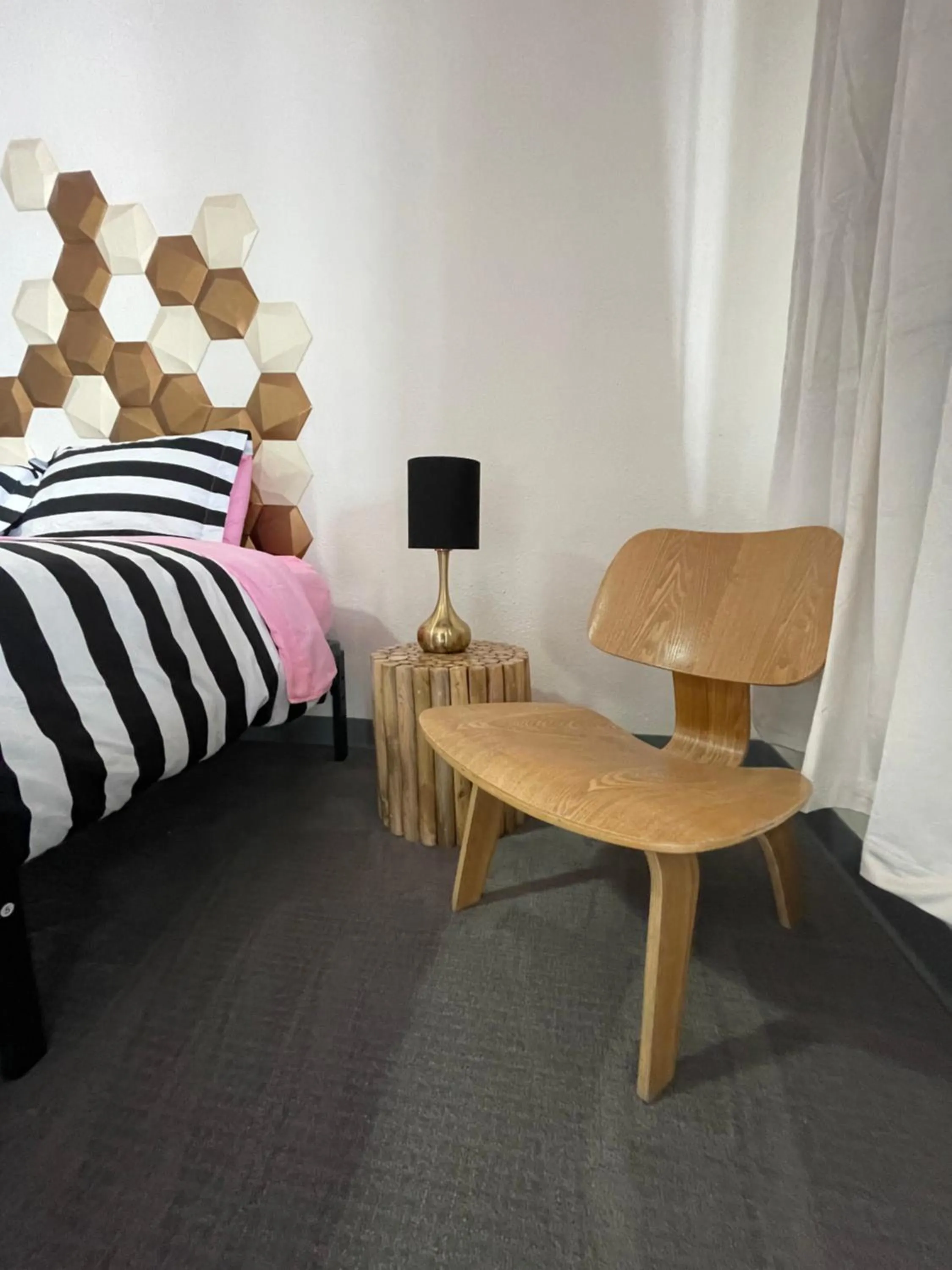 Bed in Rainbow Motel