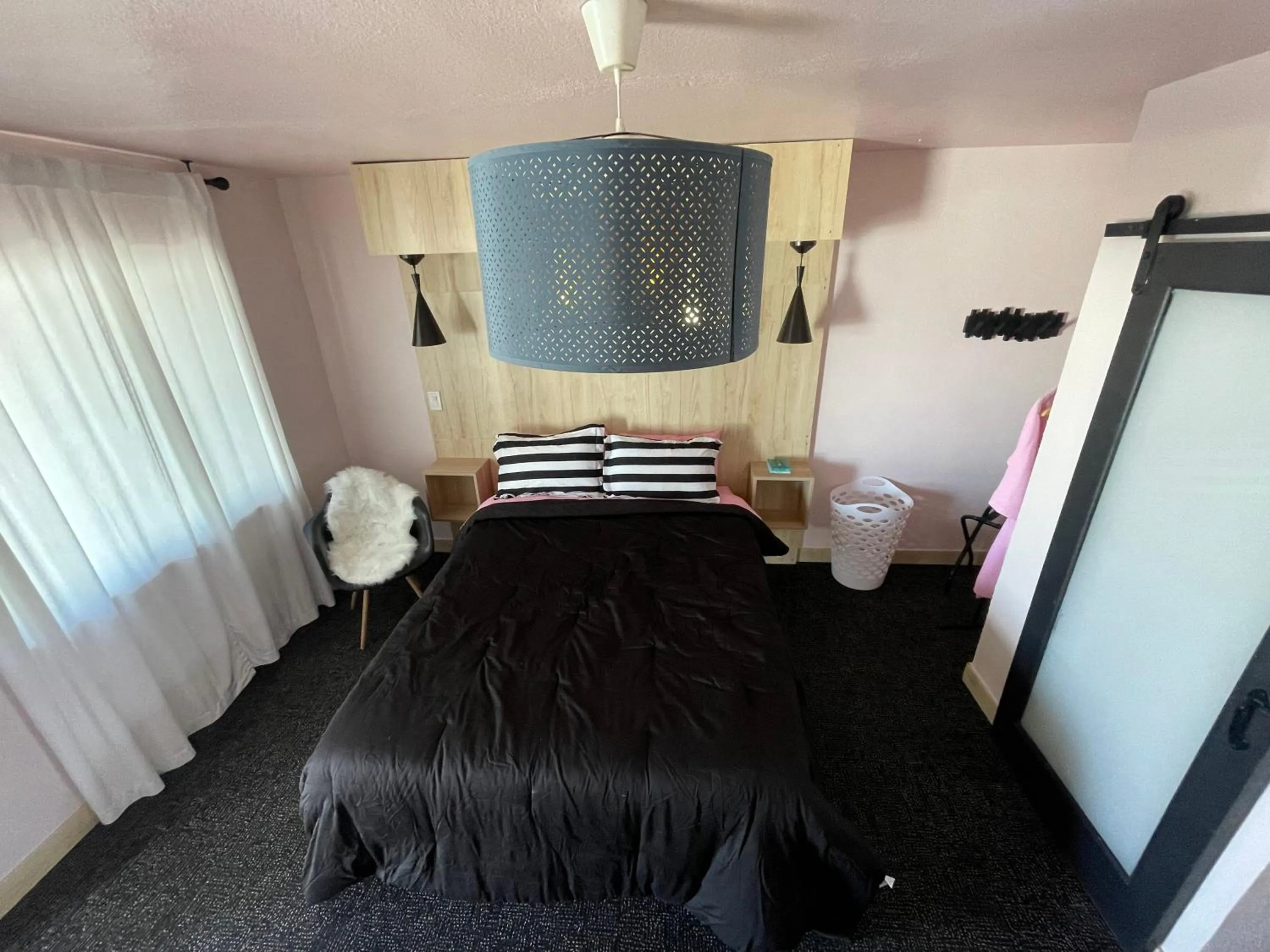 Bed in Rainbow Motel