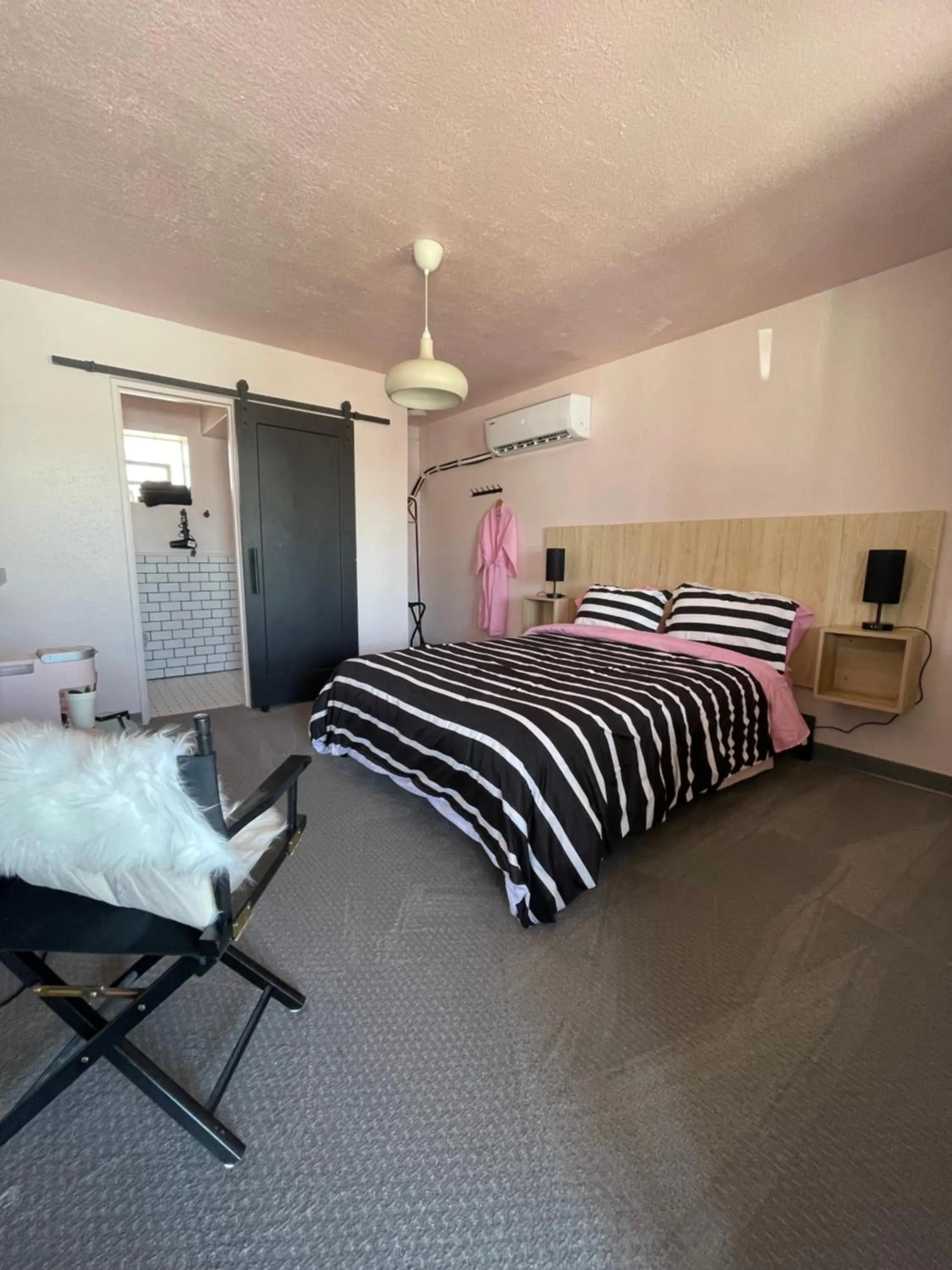 Bed in Rainbow Motel