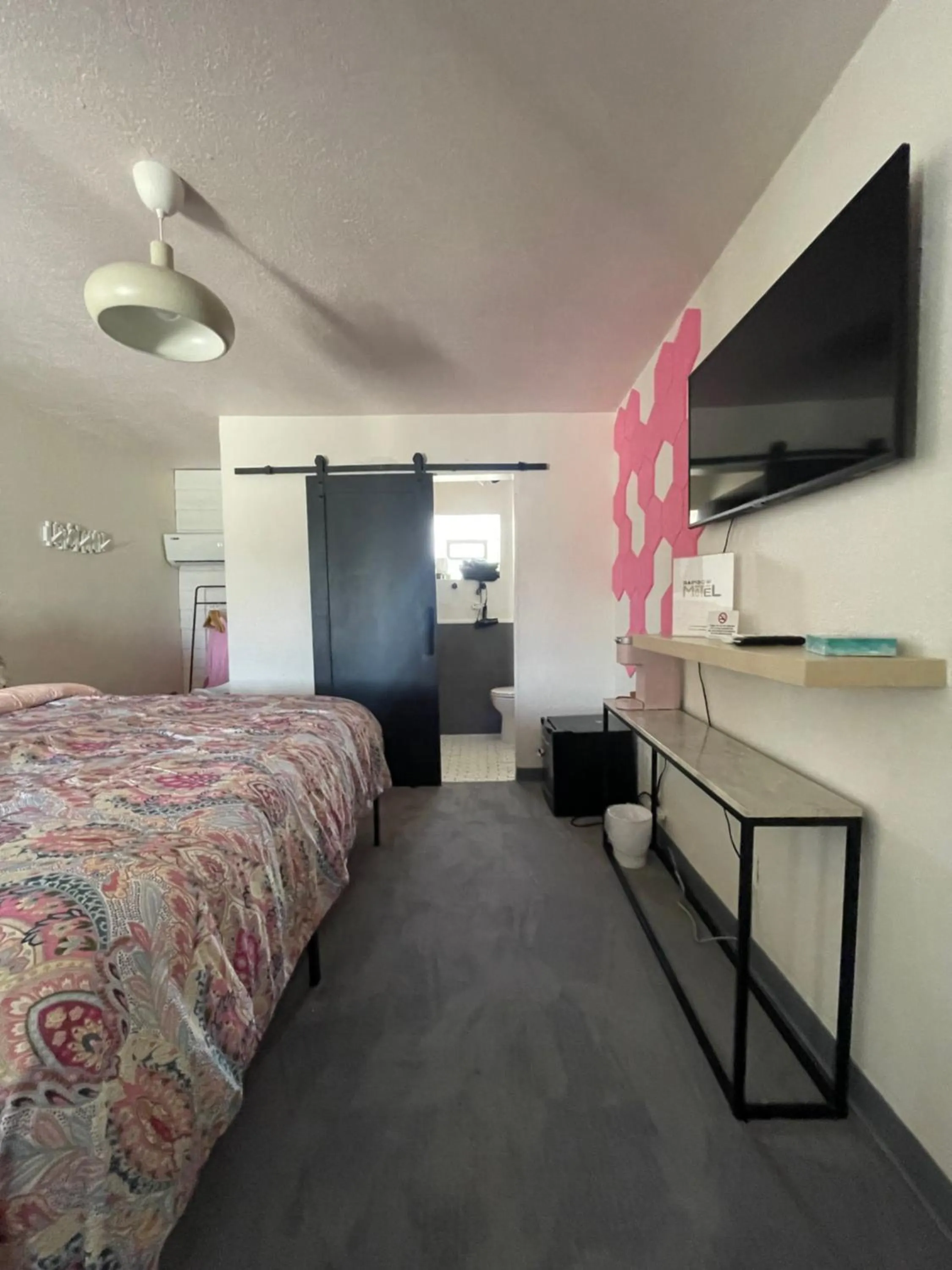 Bed in Rainbow Motel