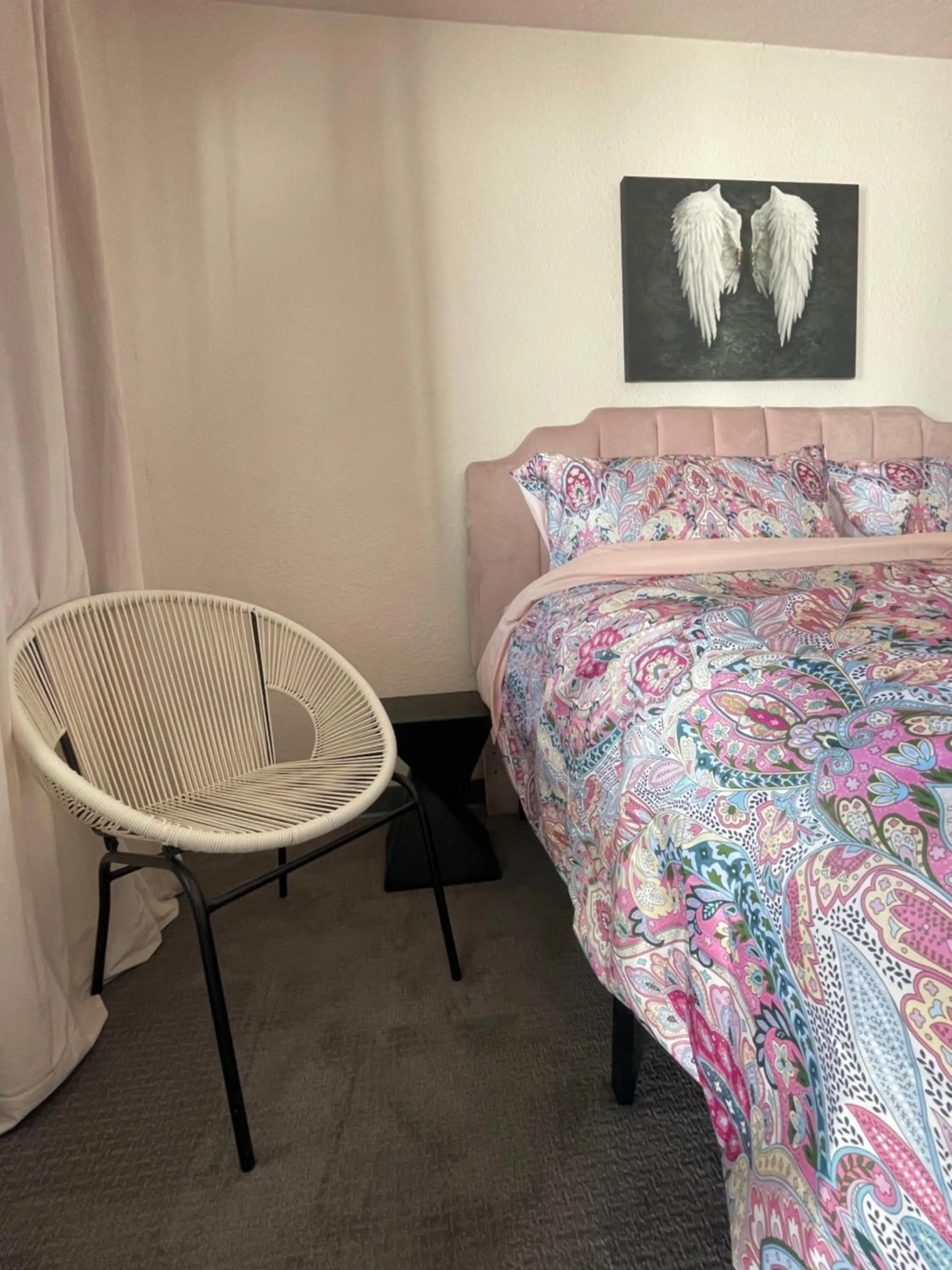 Bed in Rainbow Motel