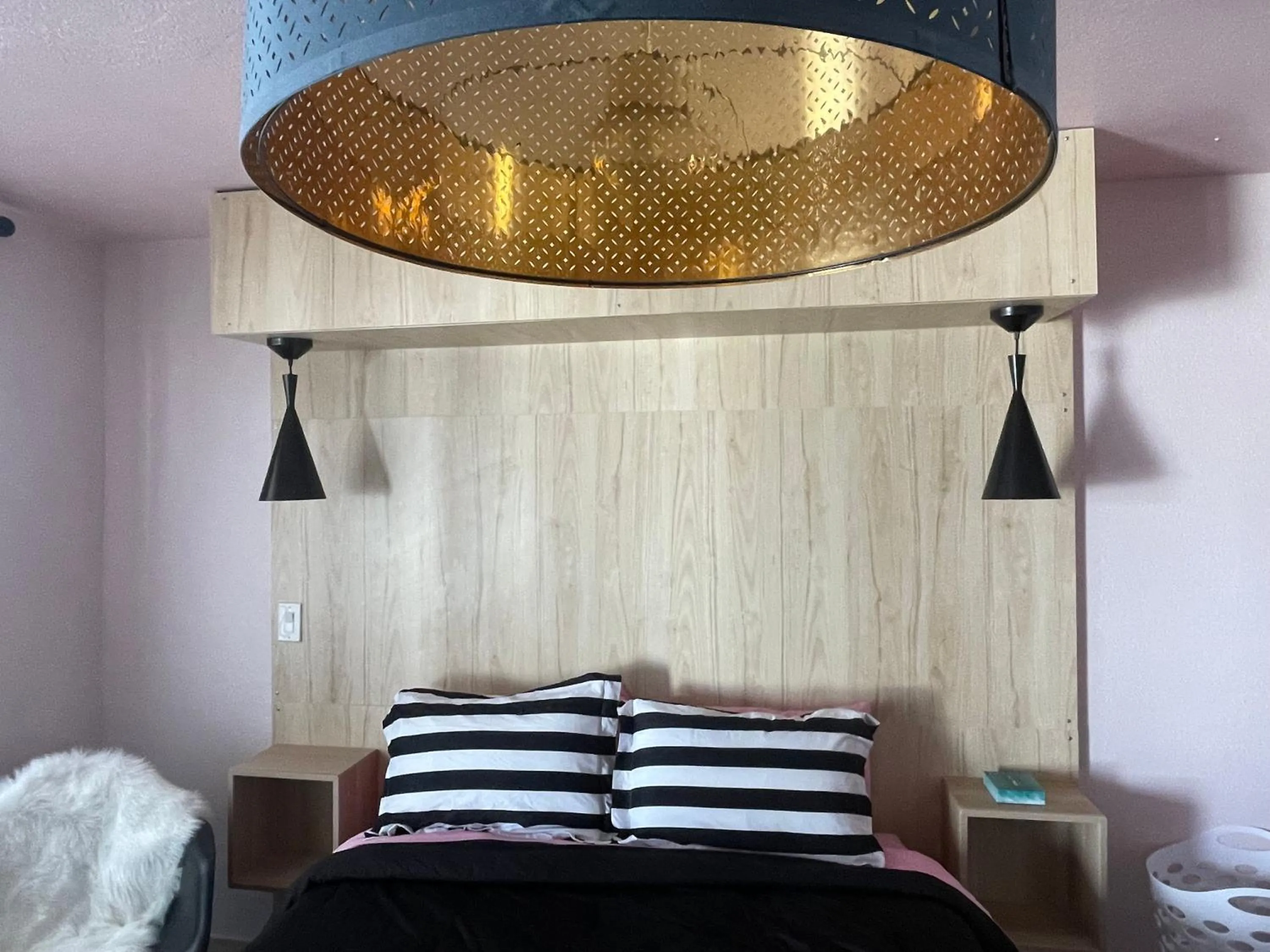 Bed in Rainbow Motel