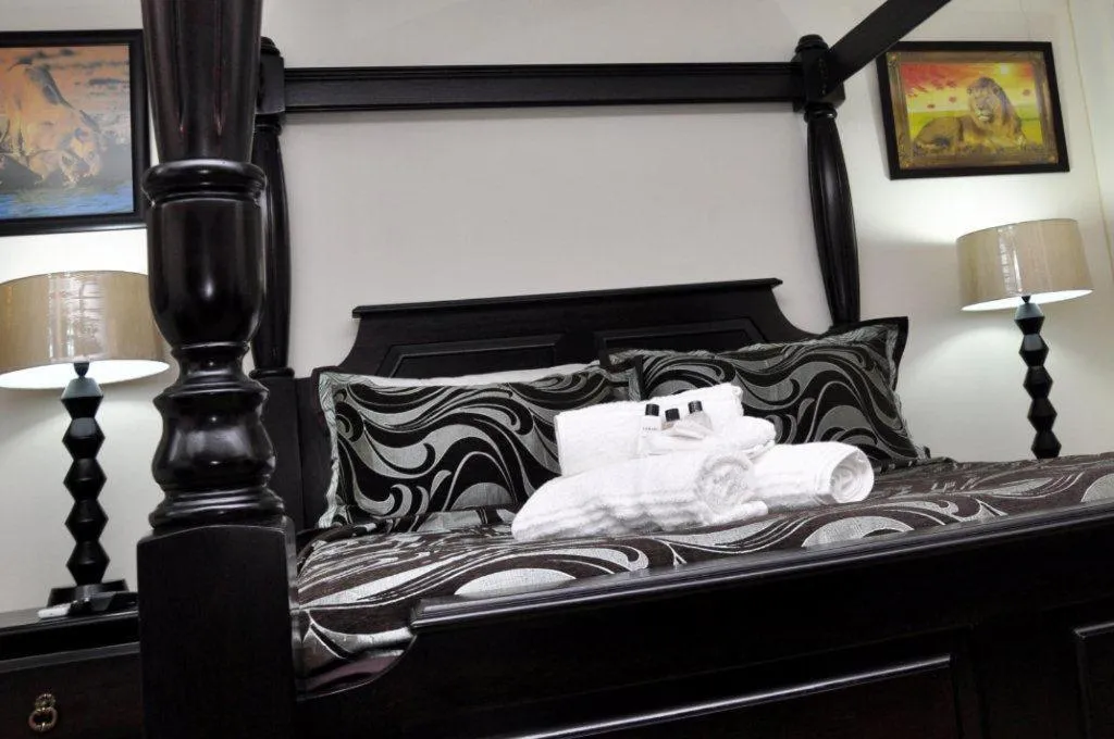 Bed in Montana Boutique Guesthouse