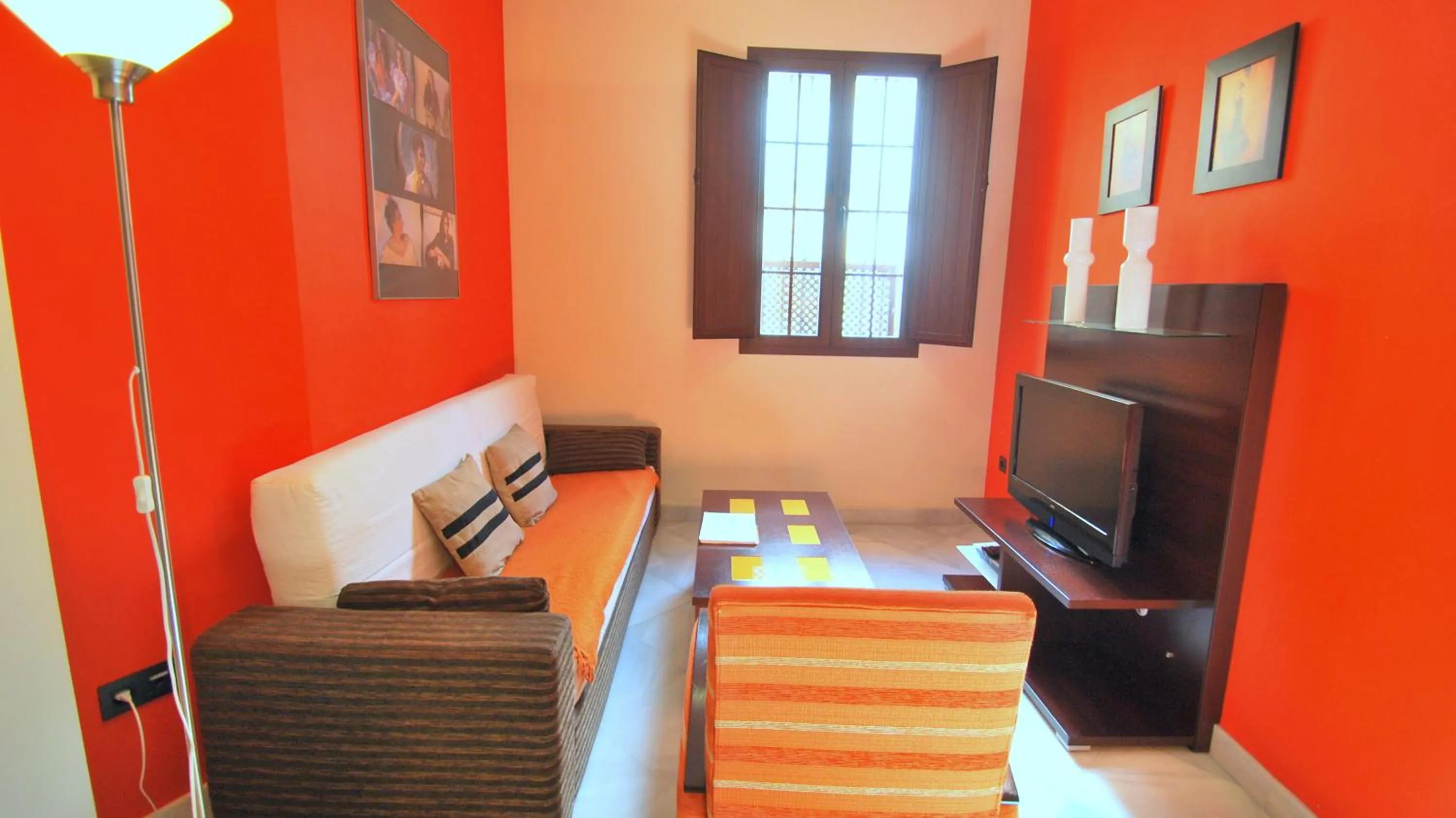 Living room, Bed in Living-Sevilla Apartments San Lorenzo