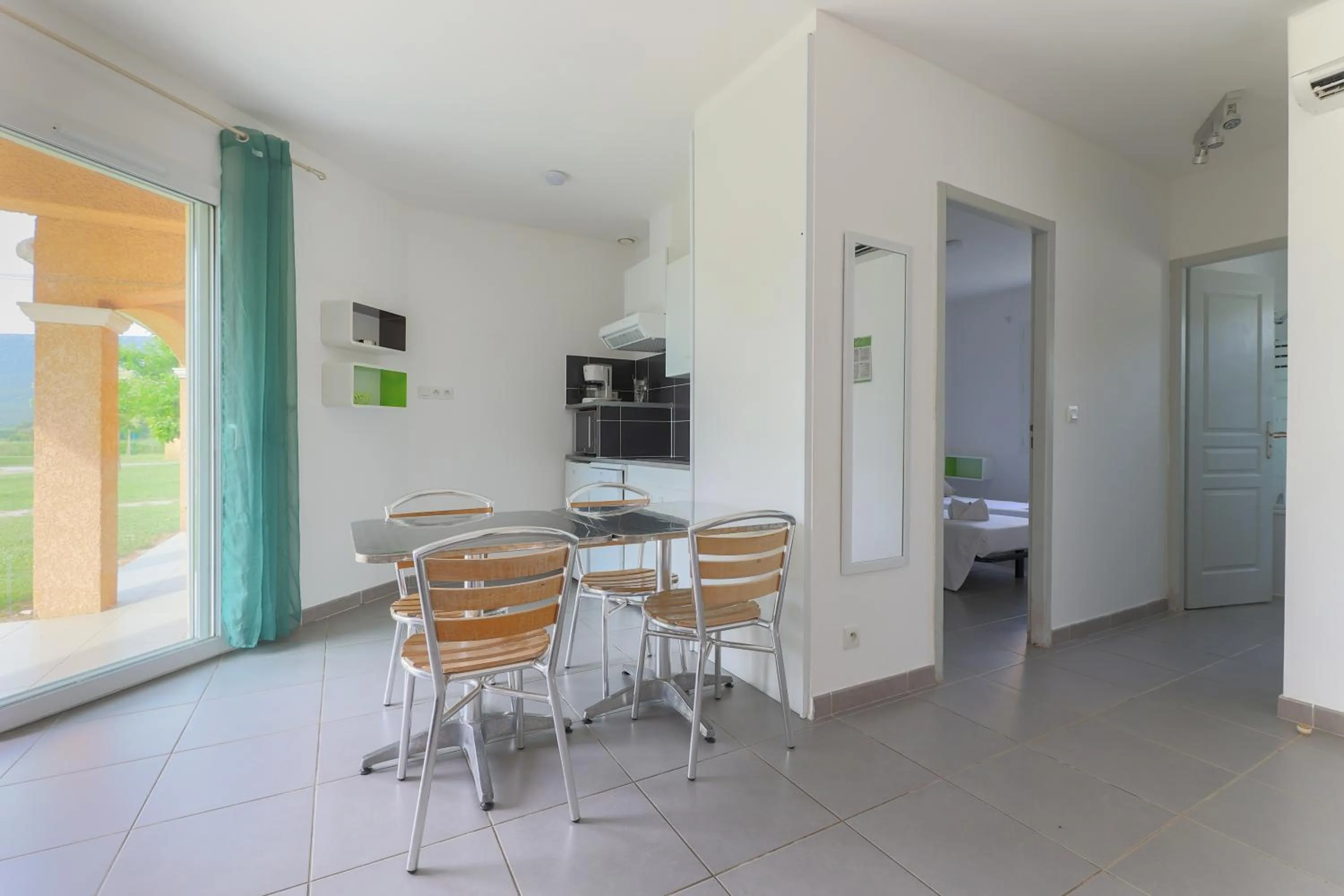 Kitchen or kitchenette in Park & Suites Village Gorges de l'Hérault-Cévennes