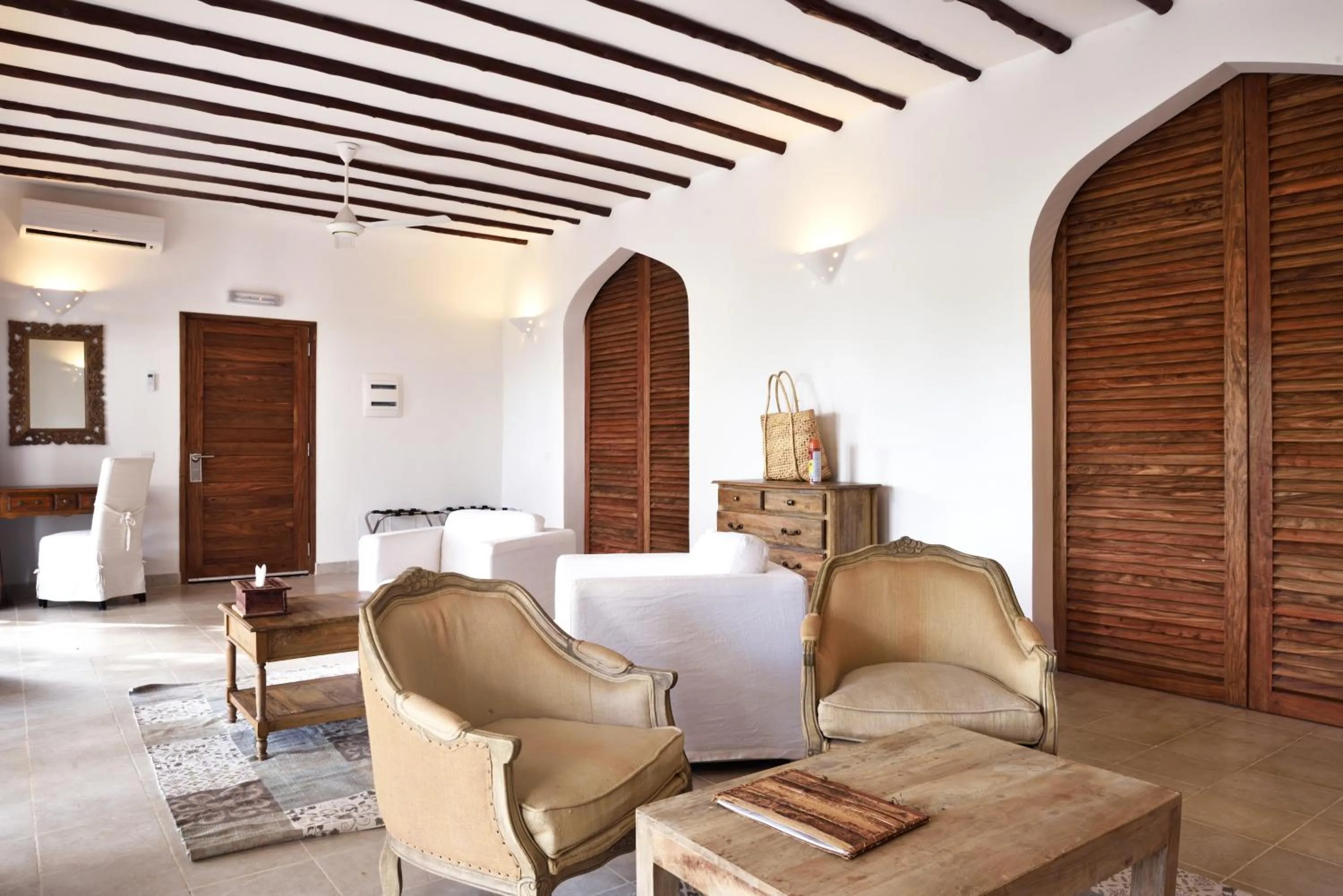 Seating area in Konokono Beach Resort and Isaraya Luxury Overwater Villas