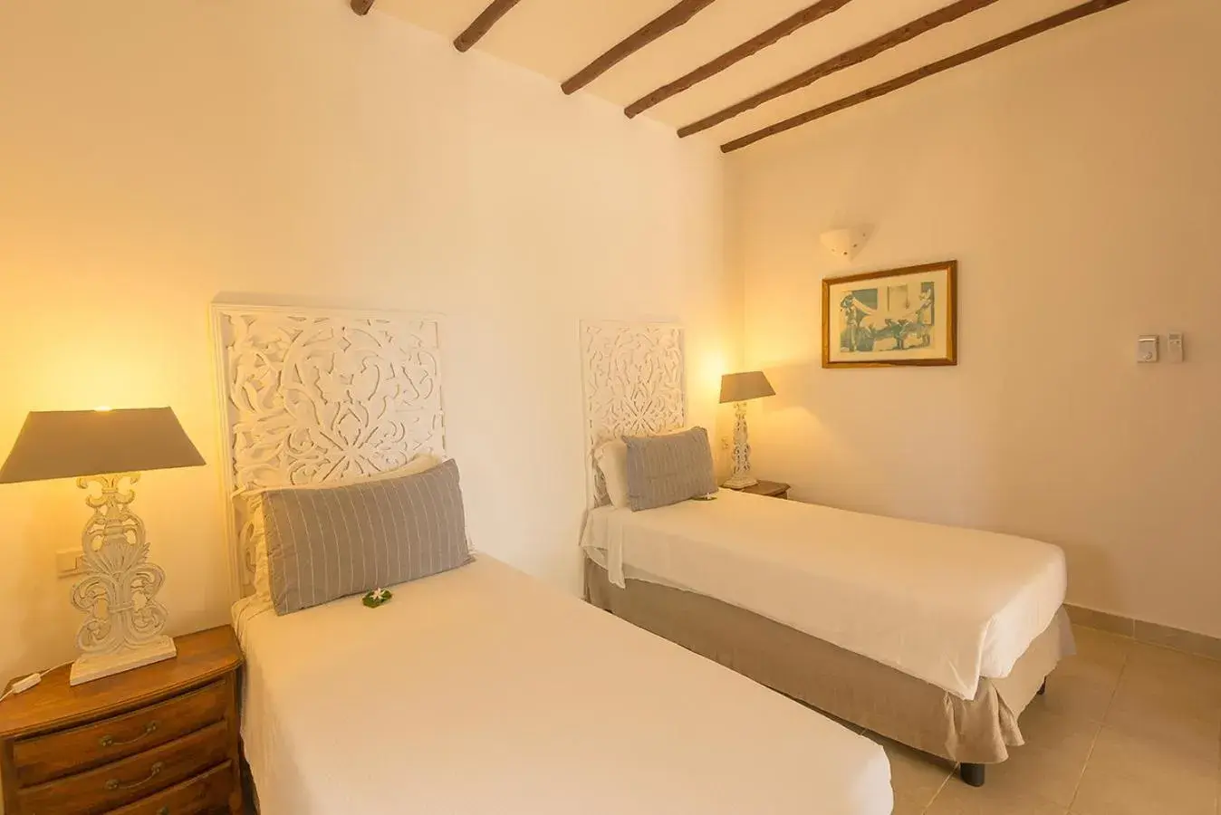 Bed in Konokono Beach Resort and Isaraya Luxury Overwater Villas Bed in Konokono Beach Resort and Isaraya Luxury Overwater Villas