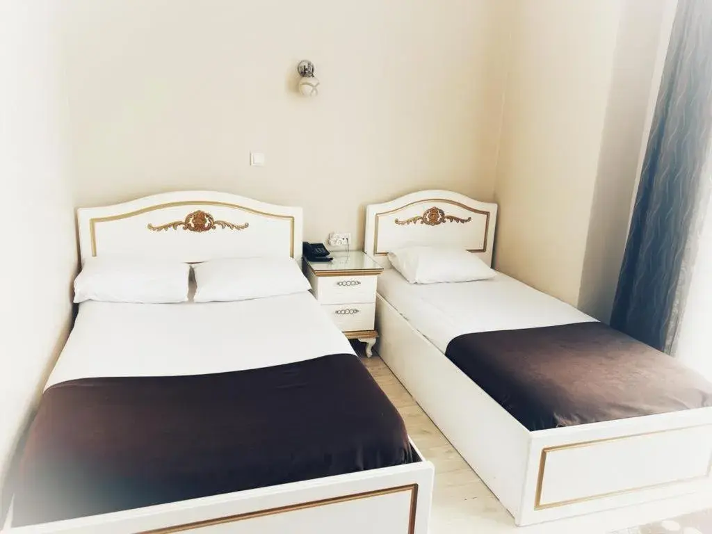 Triple Room (2 Adults + 1 Child) in Seref Hotel Triple Room (2 Adults + 1 Child) in Seref Hotel