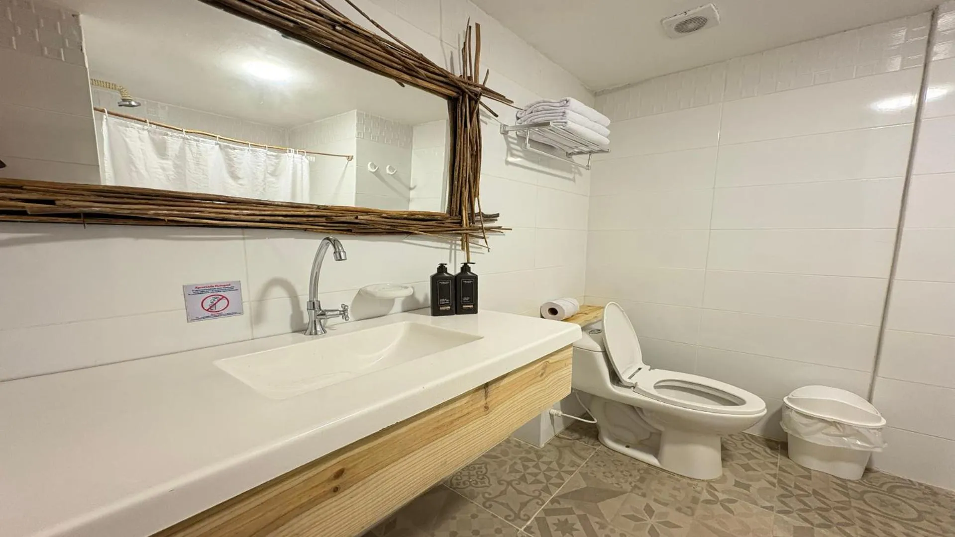 Bathroom in Hotel Blue Cove by On vacation