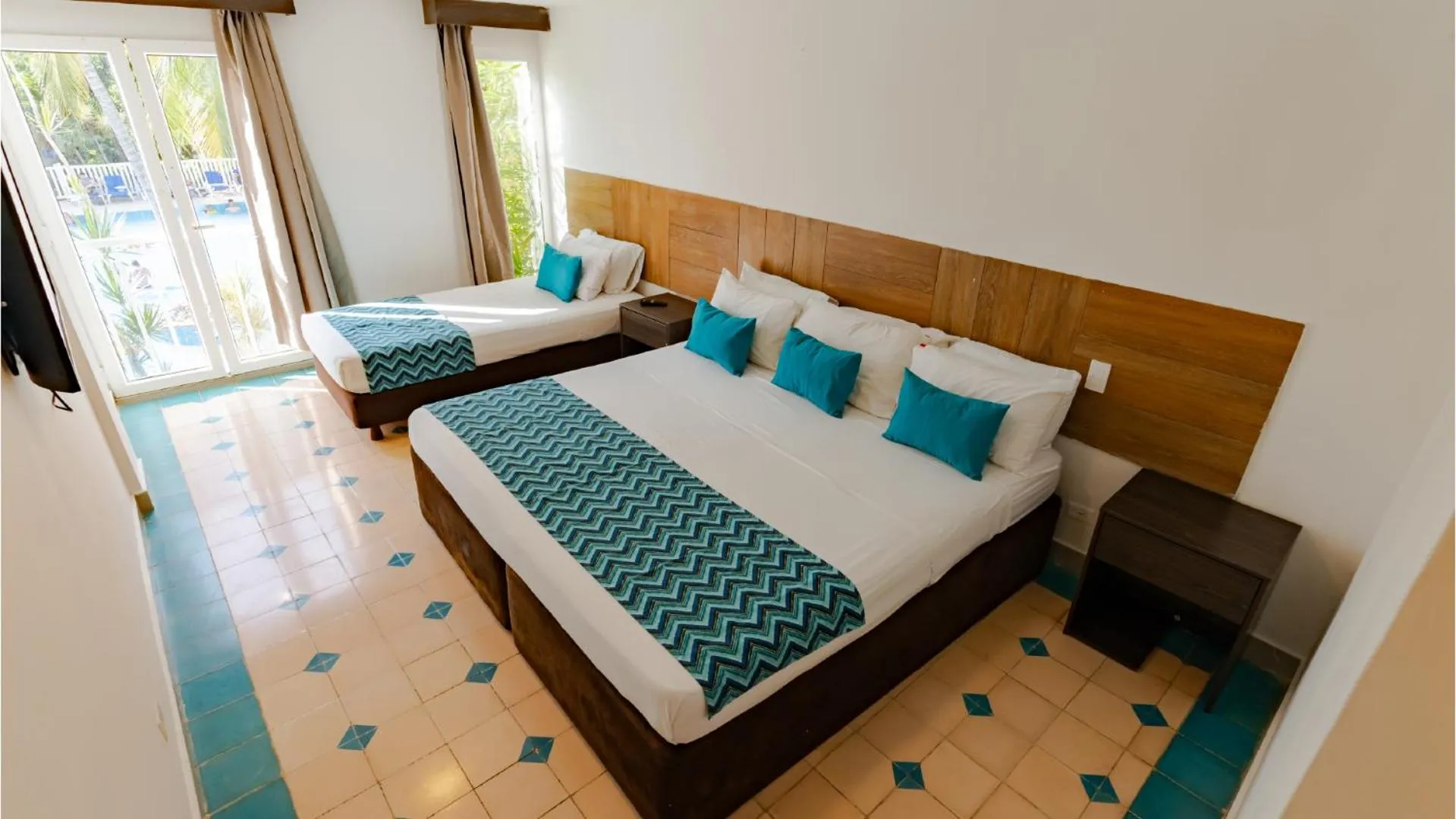 Bed in Hotel Blue Cove by On vacation