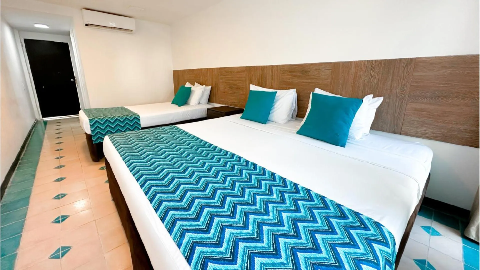 Bed in Hotel Blue Cove by On vacation