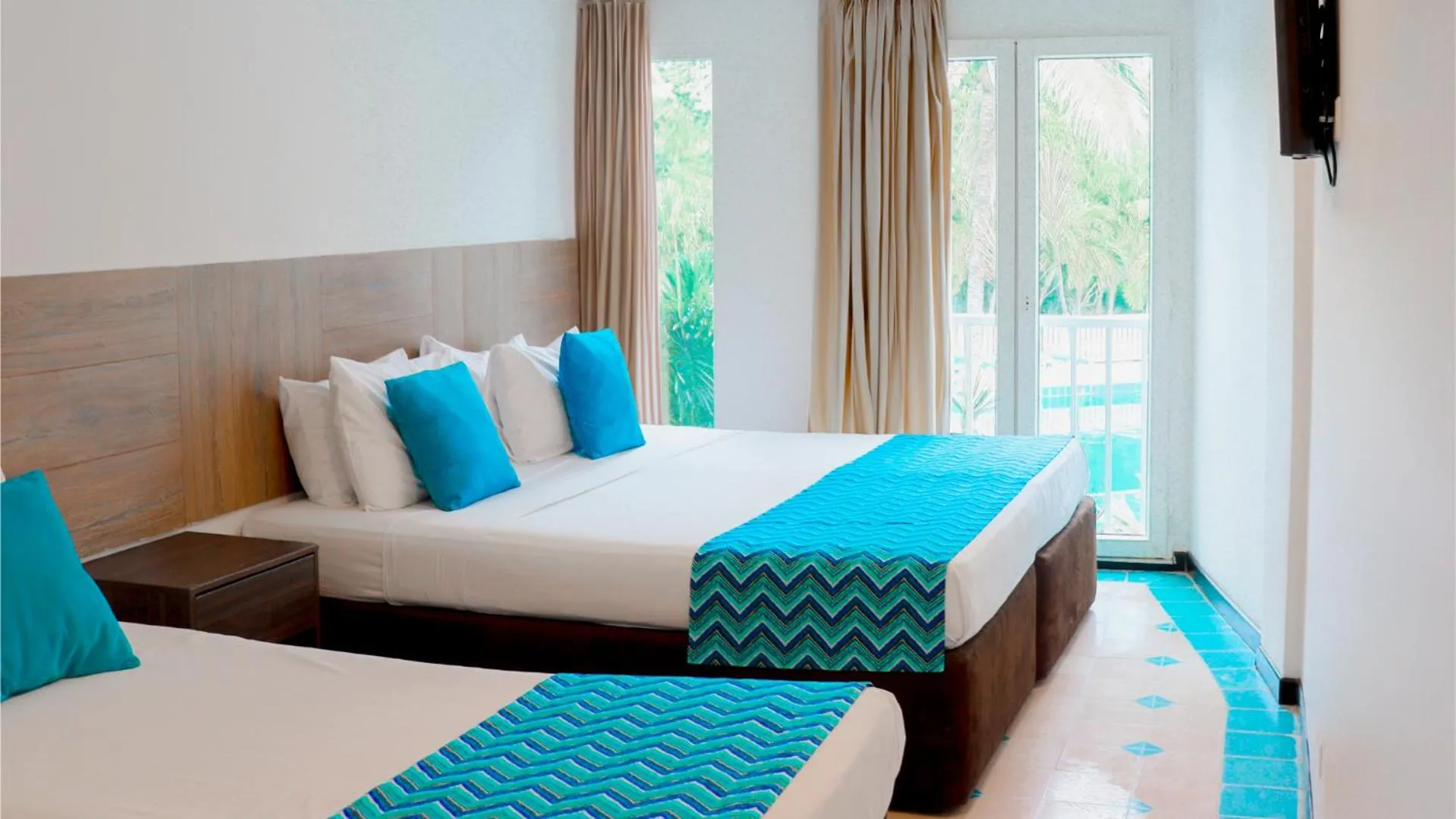Bed in Hotel Blue Cove by On vacation